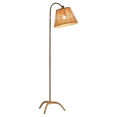 Paavo Tynell for Taito Floor Lamp in Brass and Cane