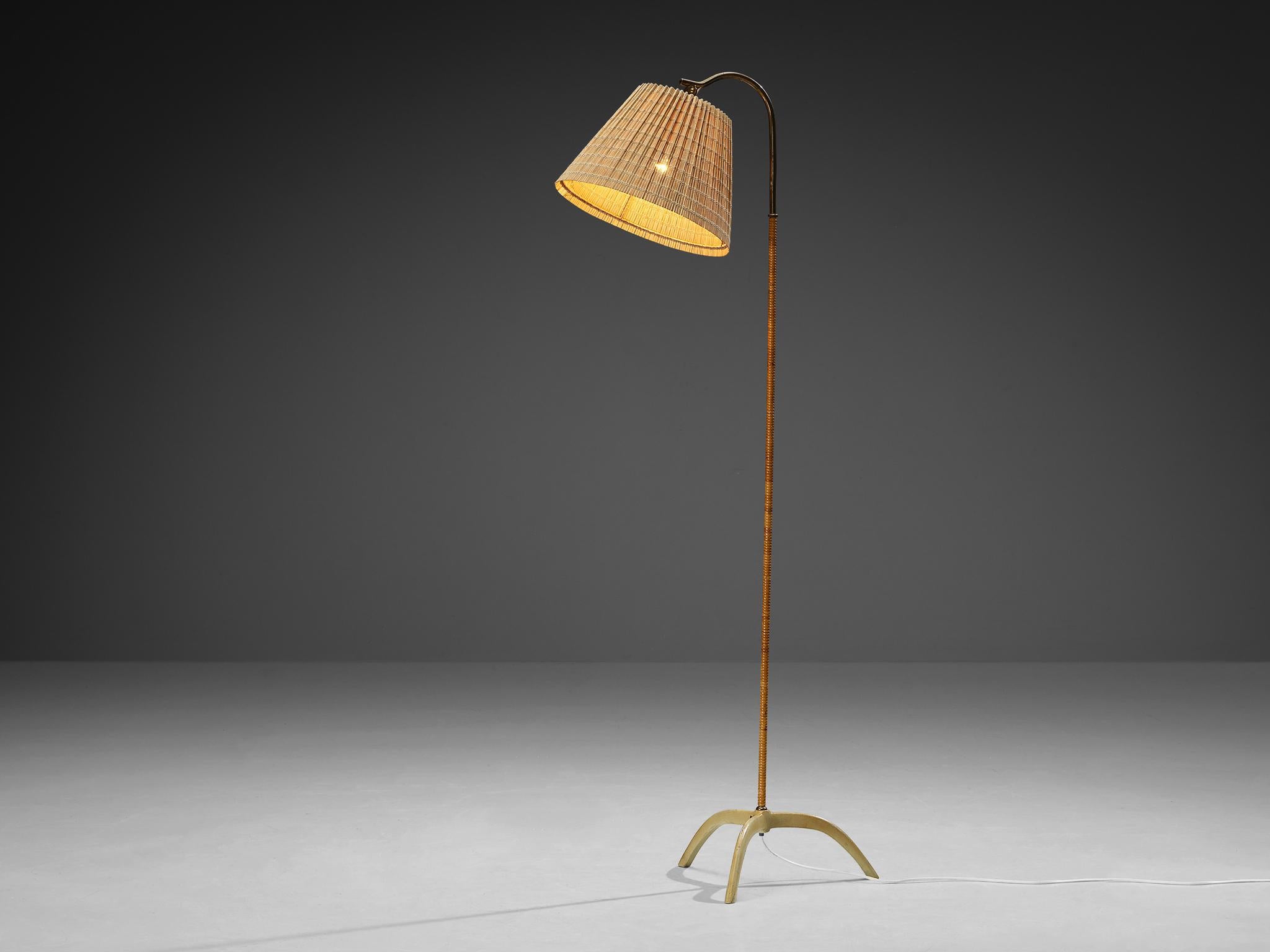 Paavo Tynell for Taito Oy, floor lamp, model '9609', cane, brass, lacquered steel, Finland, 1950s 

The 9609 floor lamp by Finnish designer Paavo Tynell is a stunning showcase of elegance and intricate detail, a visual pleasure in many senses. The