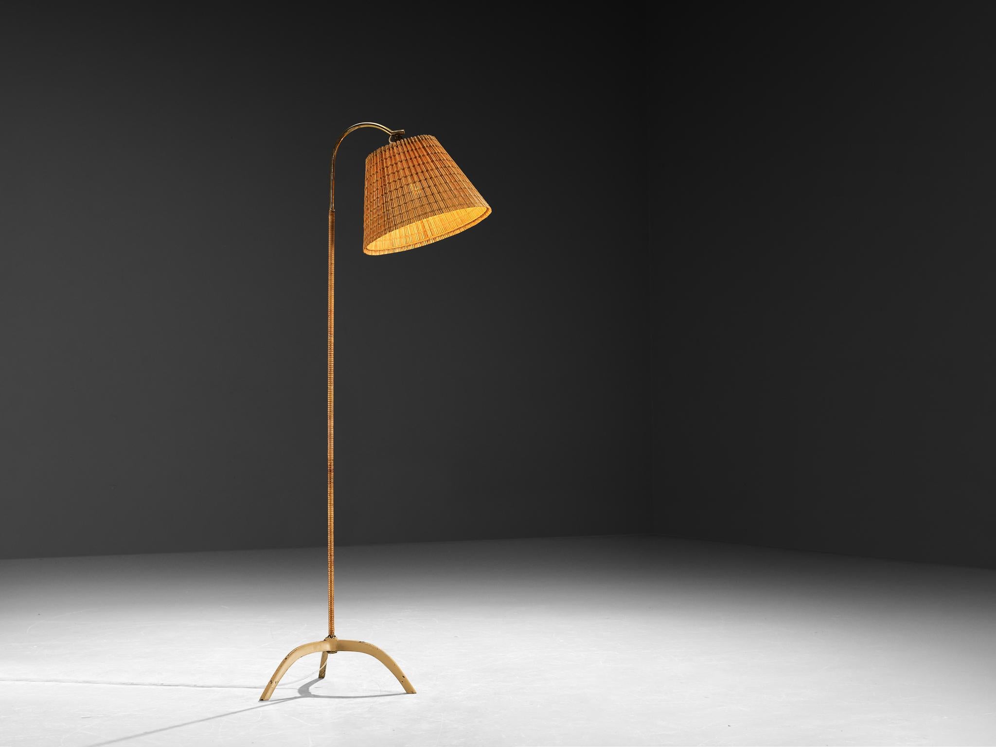 Paavo Tynell for Taito Oy, floor lamps, model '9609', cane, brass, lacquered steel, Finland, 1950s 

The 9609 floor lamps by Finnish designer Paavo Tynell are a stunning showcase of elegance and intricate detail, a visual pleasure in many senses.
