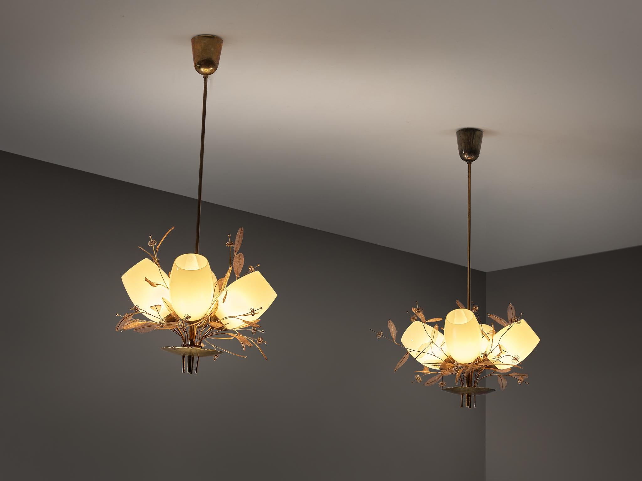 Paavo Tynell for Taito Oy, chandeliers from the 'Concerto' series, model '9029/4', brass, glass, metal, Finland, 1948

This majestic chandelier is designed by the master in the fields of lighting Paavo Tynell and is part of the 'Concerto' line. From
