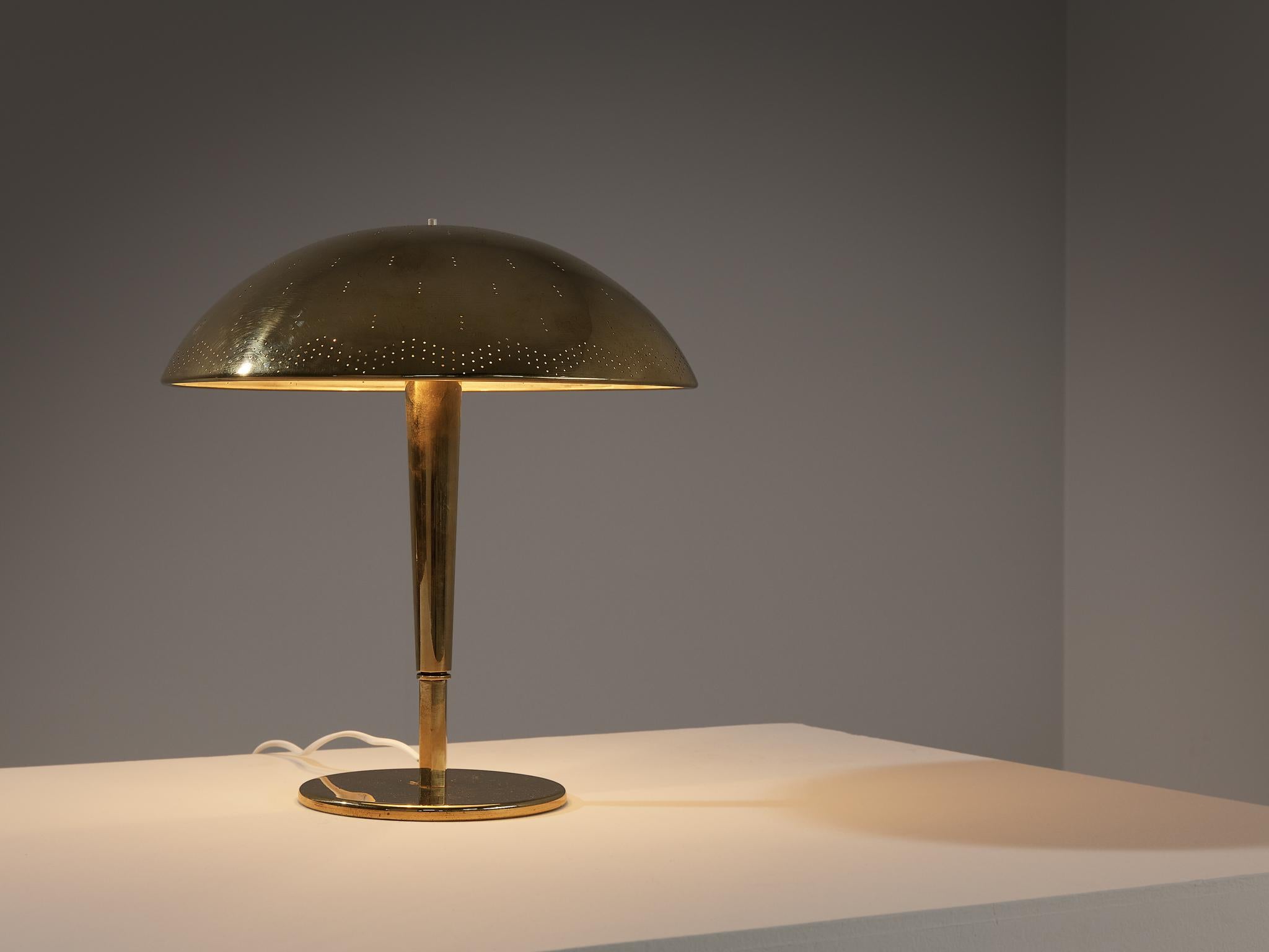 Paavo Tynell for Taito Oy, table lamp, model ‘5061’, brass, Finland, circa 1950

A truly magnificent piece that scores highly on every design aspect: execution, use of materials, craftsmanship, and detail. Paavo Tynell, the master in the fields of