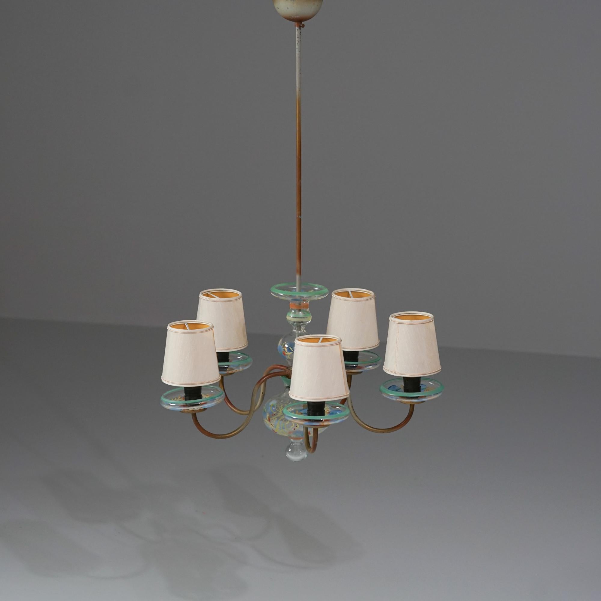 Glass chandelier desgined by Paavo Tynell. Glass parts manufactured by Kauklahti Glass Factory, manufactured by Taito Oy, 1930/1940s. Glass made by Kauklahden lasi. Hand-painted glass, metal frame, fabric shades. Good vintage condition, patina