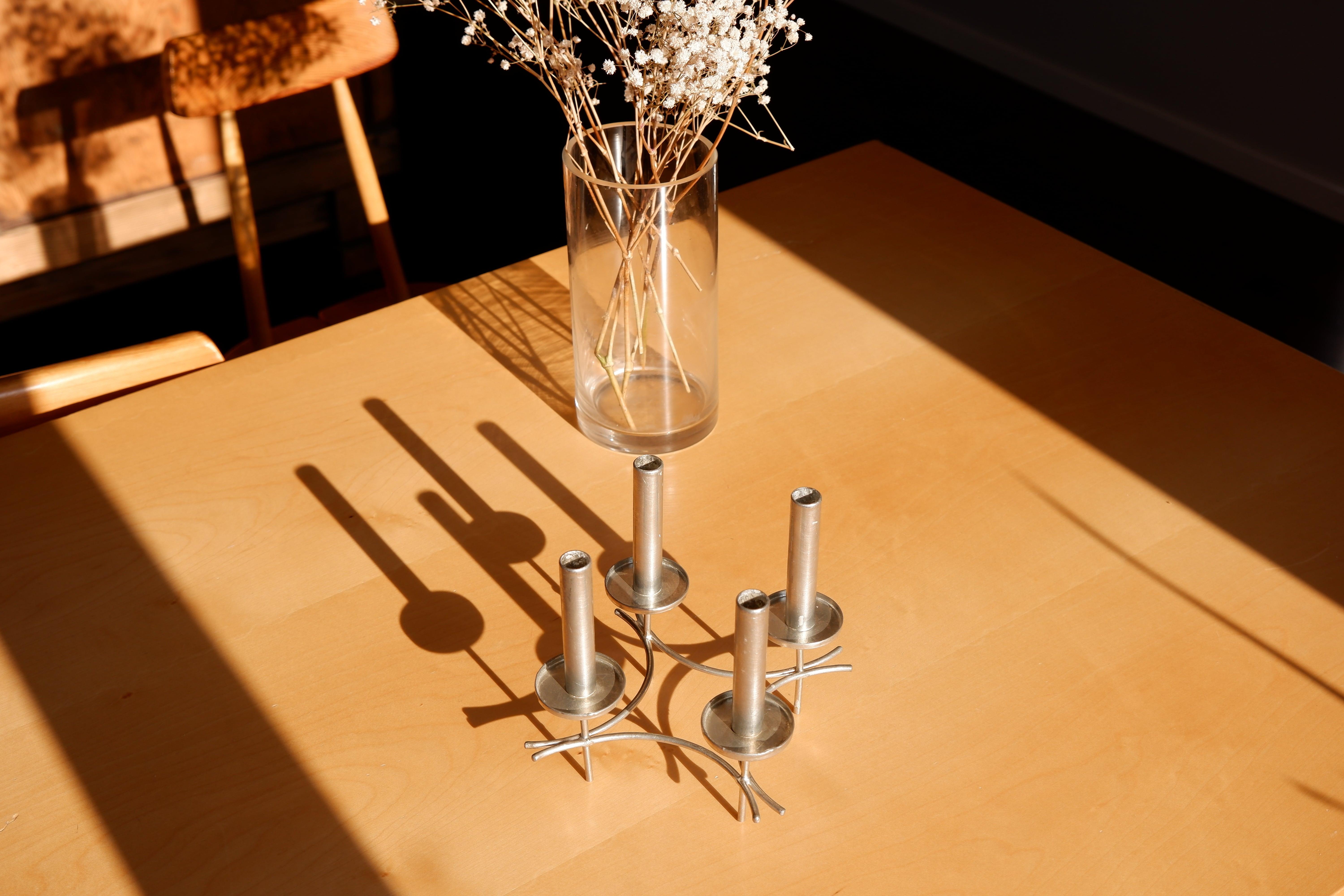 At the end of his carrier Paavo Tynell himself hand crafted a serie of candelabra that he made in nickel brass. From this collection this example has been hand crafted by Paavo Tynell in the late 60's. The piece is made in Nickel brass and can hold