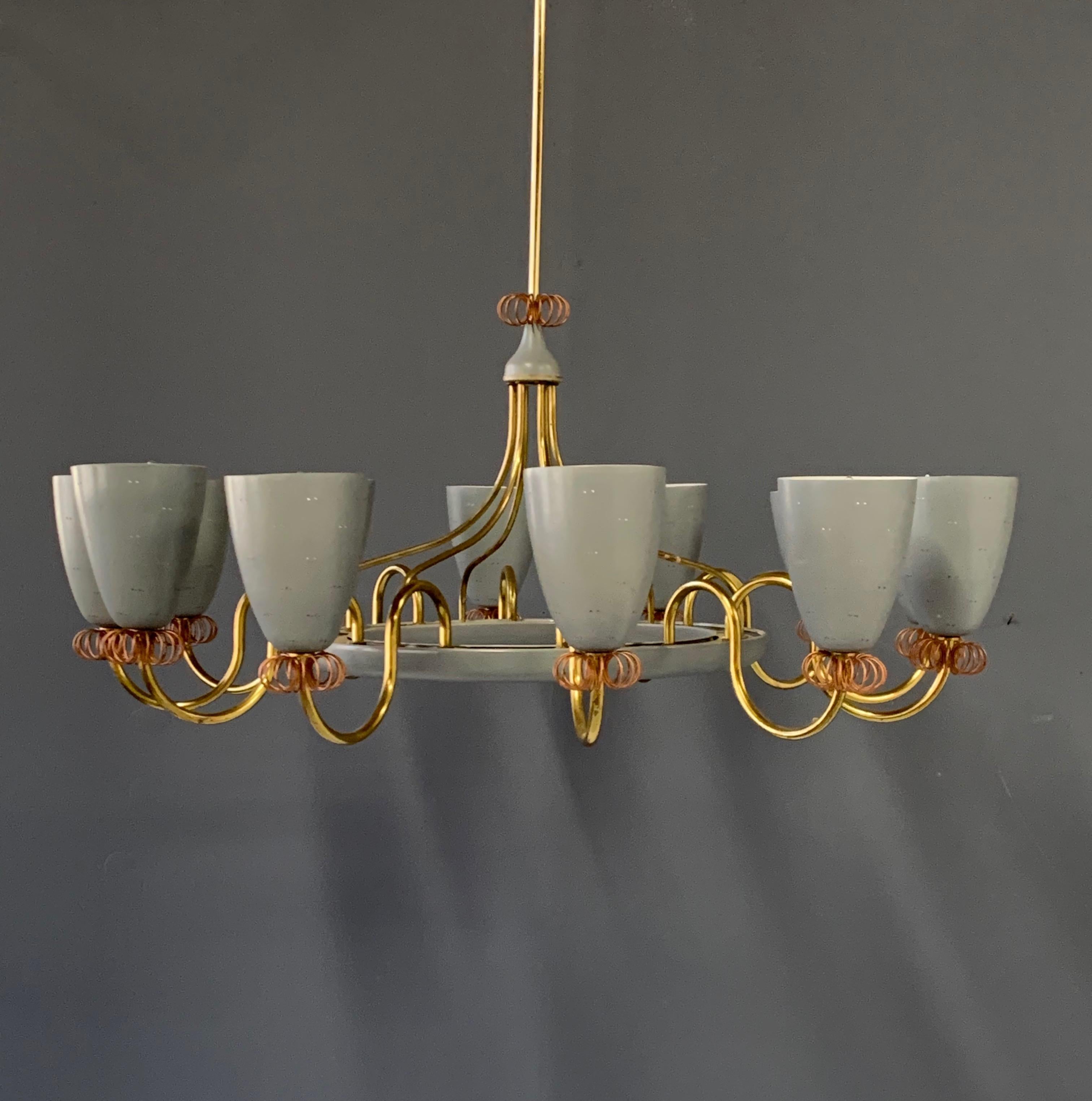 Ballerina chandelier with 12 shades by Paavo Tynell for Lightolier. 1960s brass, twelve lights on brass with copper wire decorative pieces. Shades in original grey matte enamel and perforated metal.