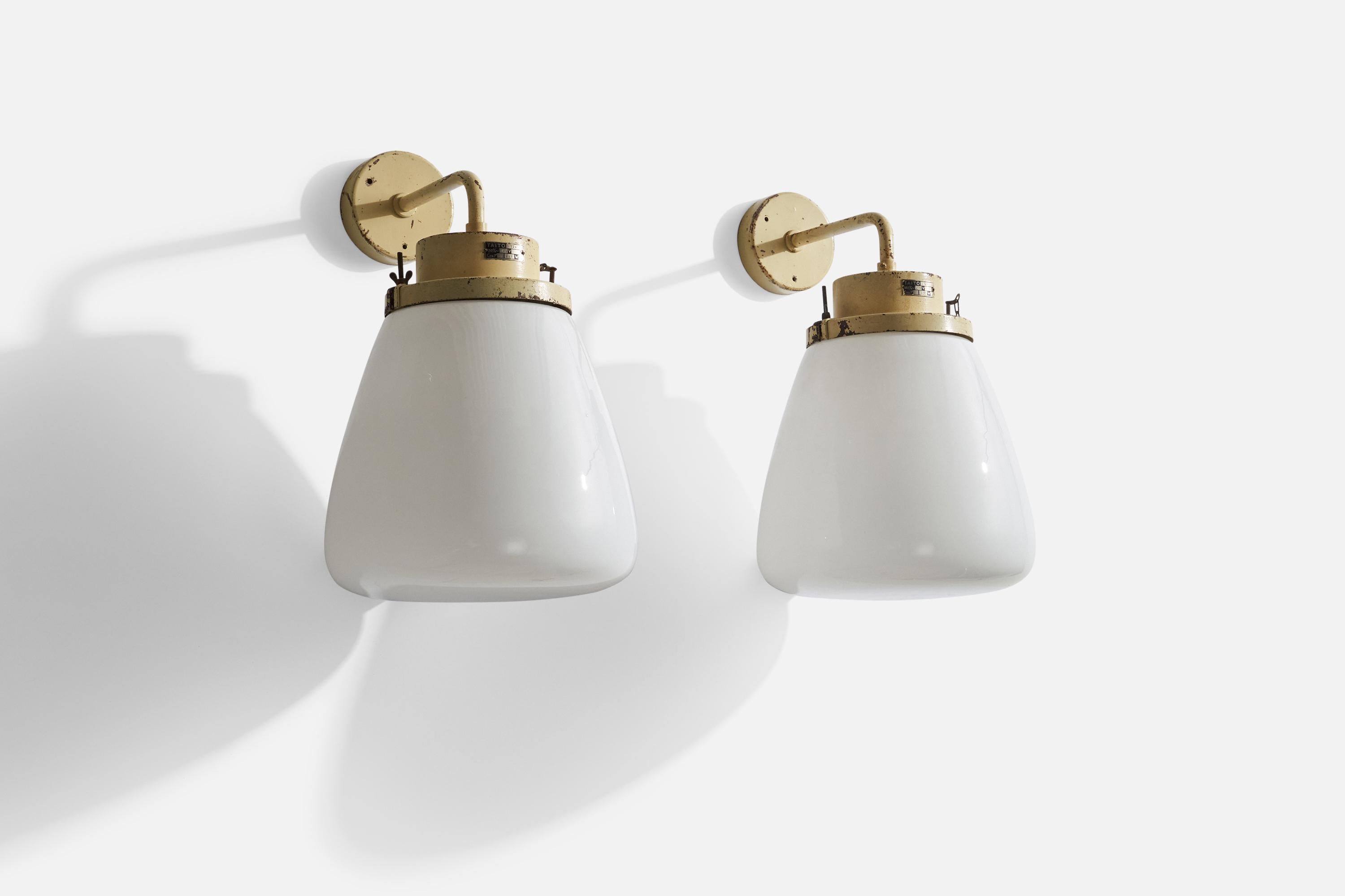 A pair of large beige-lacquered metal and opaline glass wall lights designed and produced in Finland, 1930s.

Overall Dimensions (inches): 23.63” H x 11.82” W x 16.93” D
Back Plate Dimensions (inches): 5.25 H x 5.25” W x 1.25” D
Bulb Specifications: