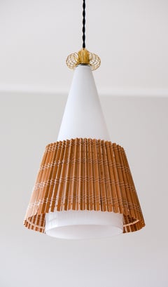 Paavo Tynell model 1082, rattan shade, circa 1960.