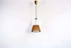 Paavo Tynell model 1082, rattan shade, circa 1960.