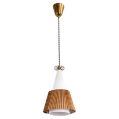 Paavo Tynell model 1082, rattan shade, circa 1960.