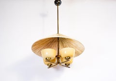 Paavo Tynell model 1359, brass and opal glass for Taito circa 1940.