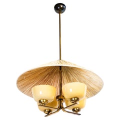 Paavo Tynell model 1359, brass and opal glass for Taito circa 1940.