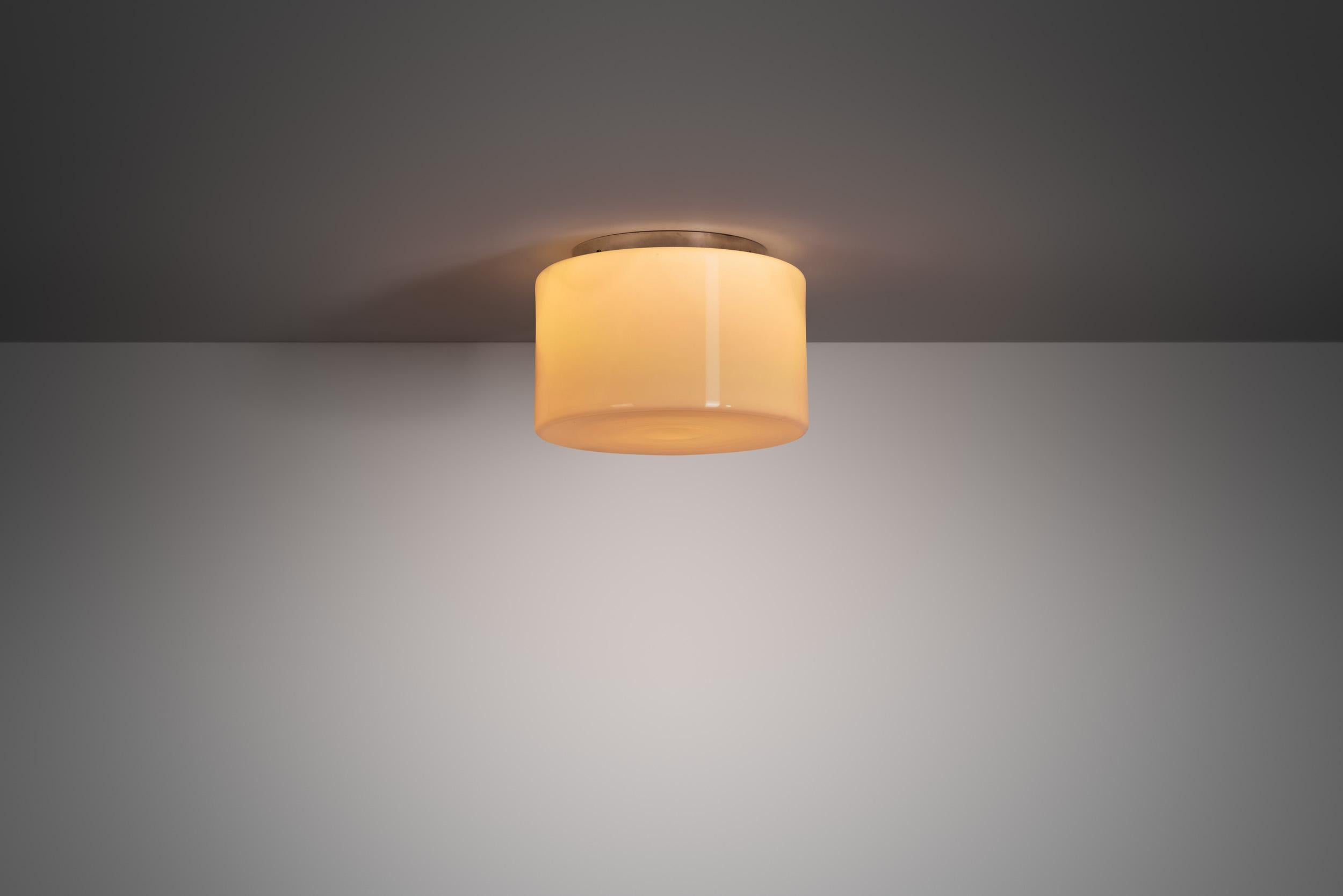 Paavo Tynell’s opal glass flush mounts are some of his most celebrated works, blending modernist minimalism with a soft, organic aesthetic. The designs are often seen as exemplifying the Scandinavian “hygge” - a focus on creating warm, comfortable,