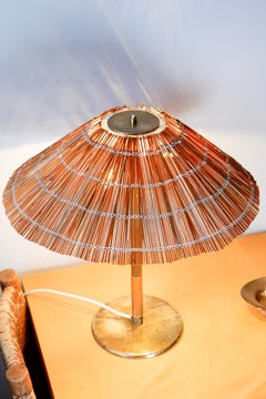 Paavo Tynell model 5068 for Taito circa 1940, Brass & wood straw.