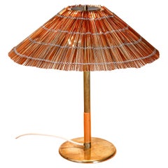 Paavo Tynell model 5068 for Taito circa 1940, Brass & wood straw.