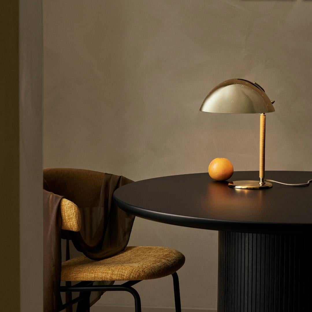 Paavo Tynell Model 9209 Brass and Rattan Table Lamp.

 Originally designed by Paavo Tynell in 1940, this authorized GUBI re-edition is executed in brass and rattan. Today, the 9209 Table Lamp is now a renowned iconic collectors item.

Held in place