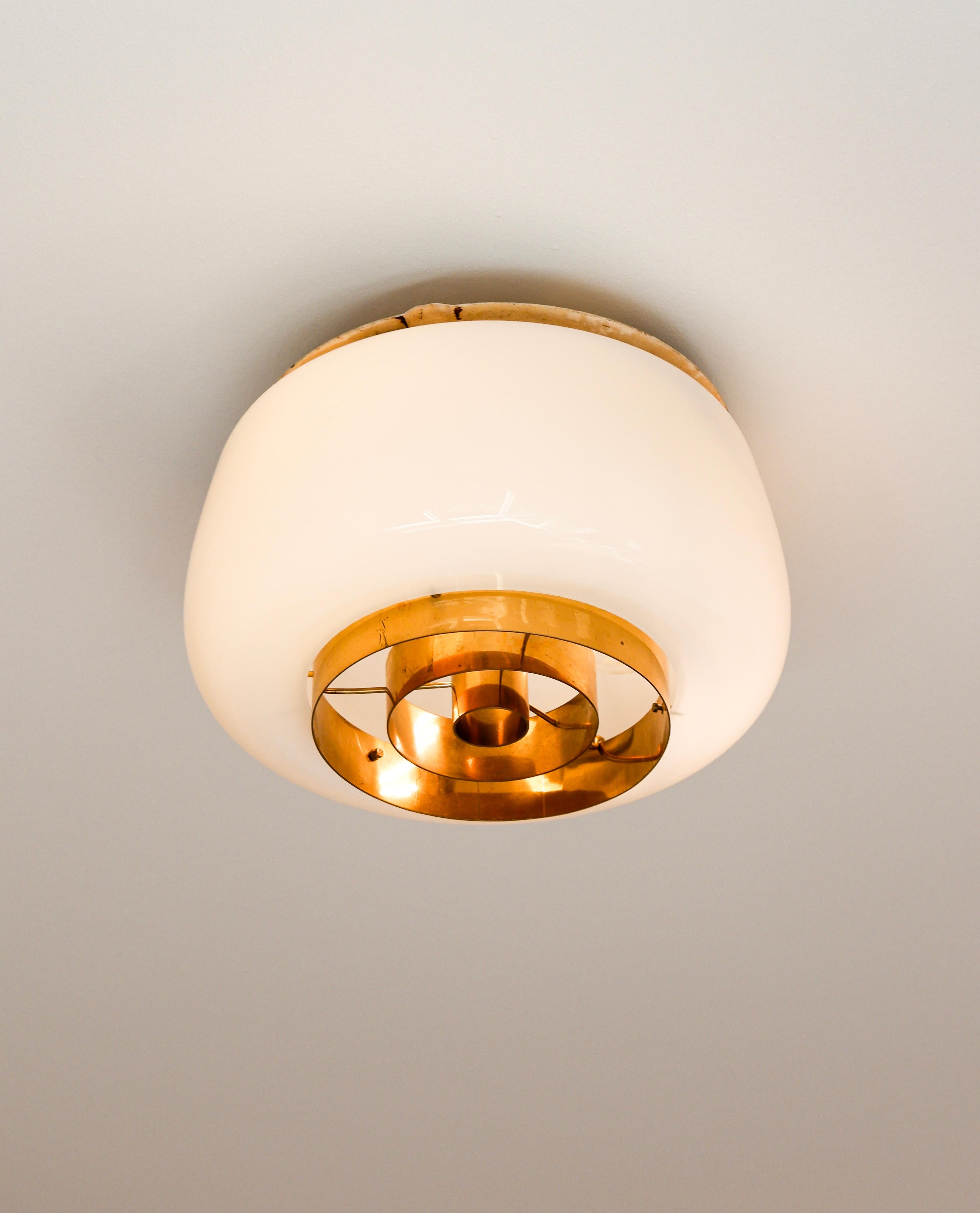 Scandinavian Paavo Tynell model H2-70 for Idman, Opal glass & brass, 1955.