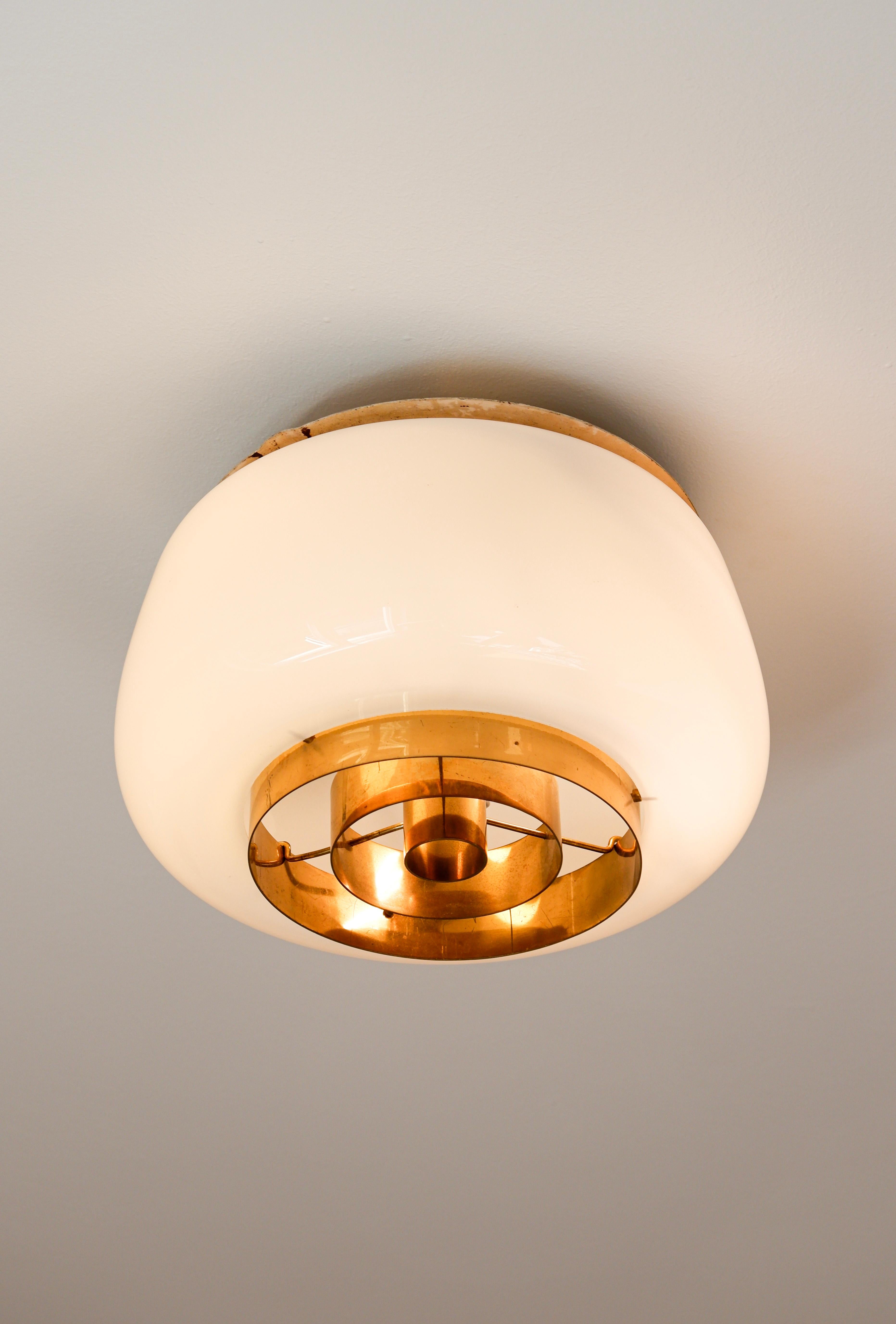 Brass Paavo Tynell model H2-70 for Idman, Opal glass & brass, 1955.