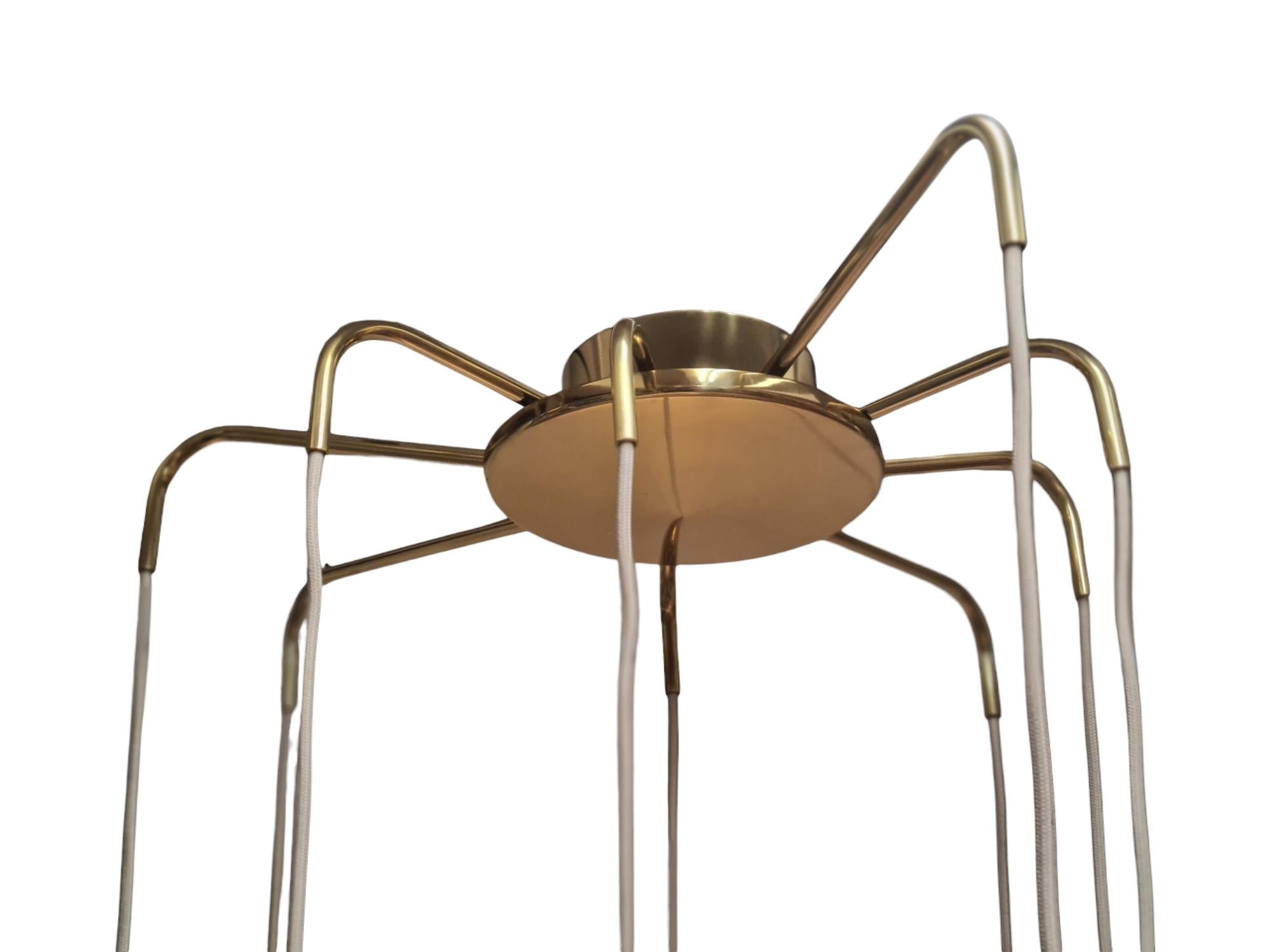 Paavo Tynell Nine Arm Perforated Brass Chandelier Model 1994/9, Taito 1950s in vendita 1
