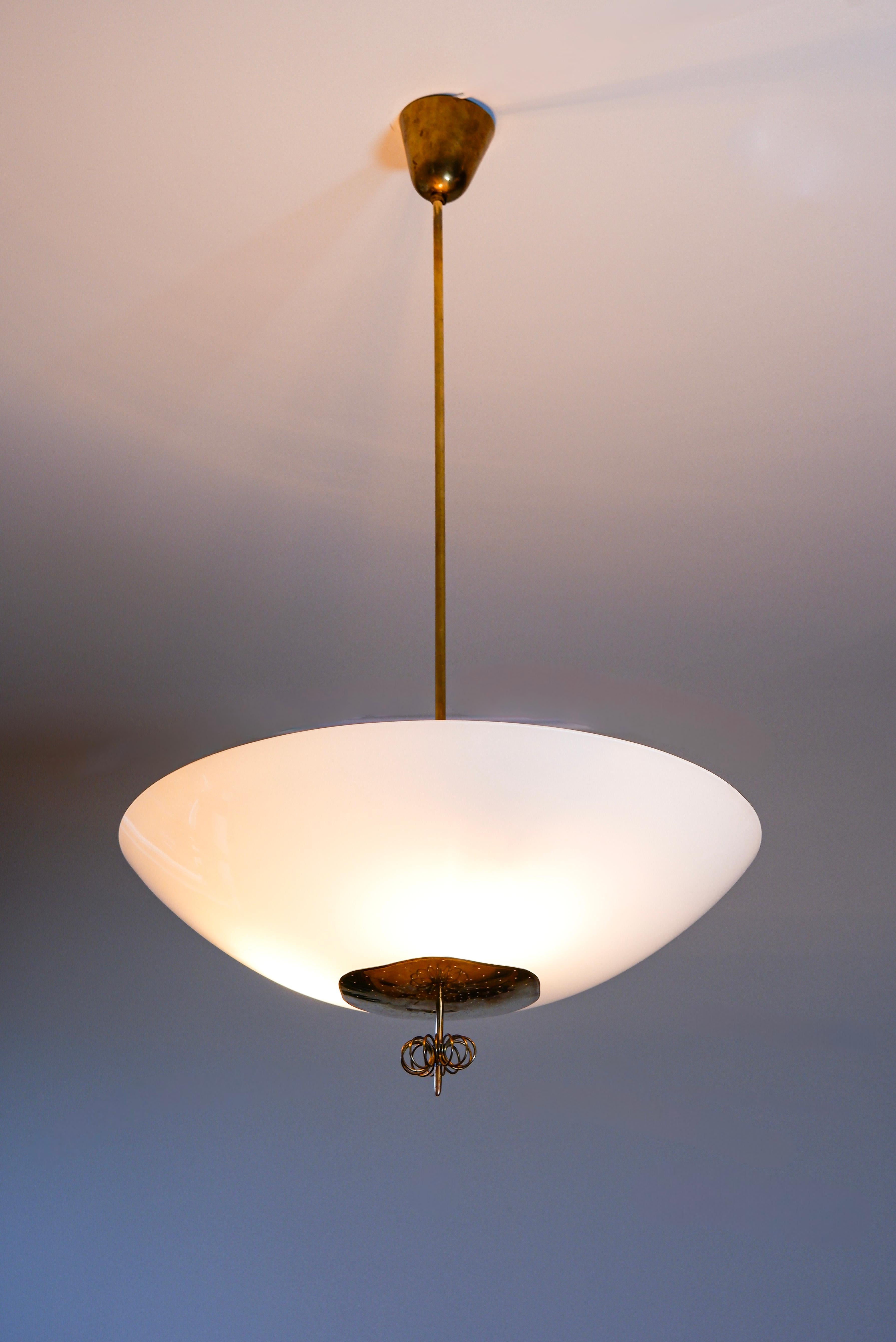 Mid-20th Century Paavo Tynell, oversized chandelier circa 1940, Opal & brass. For Sale