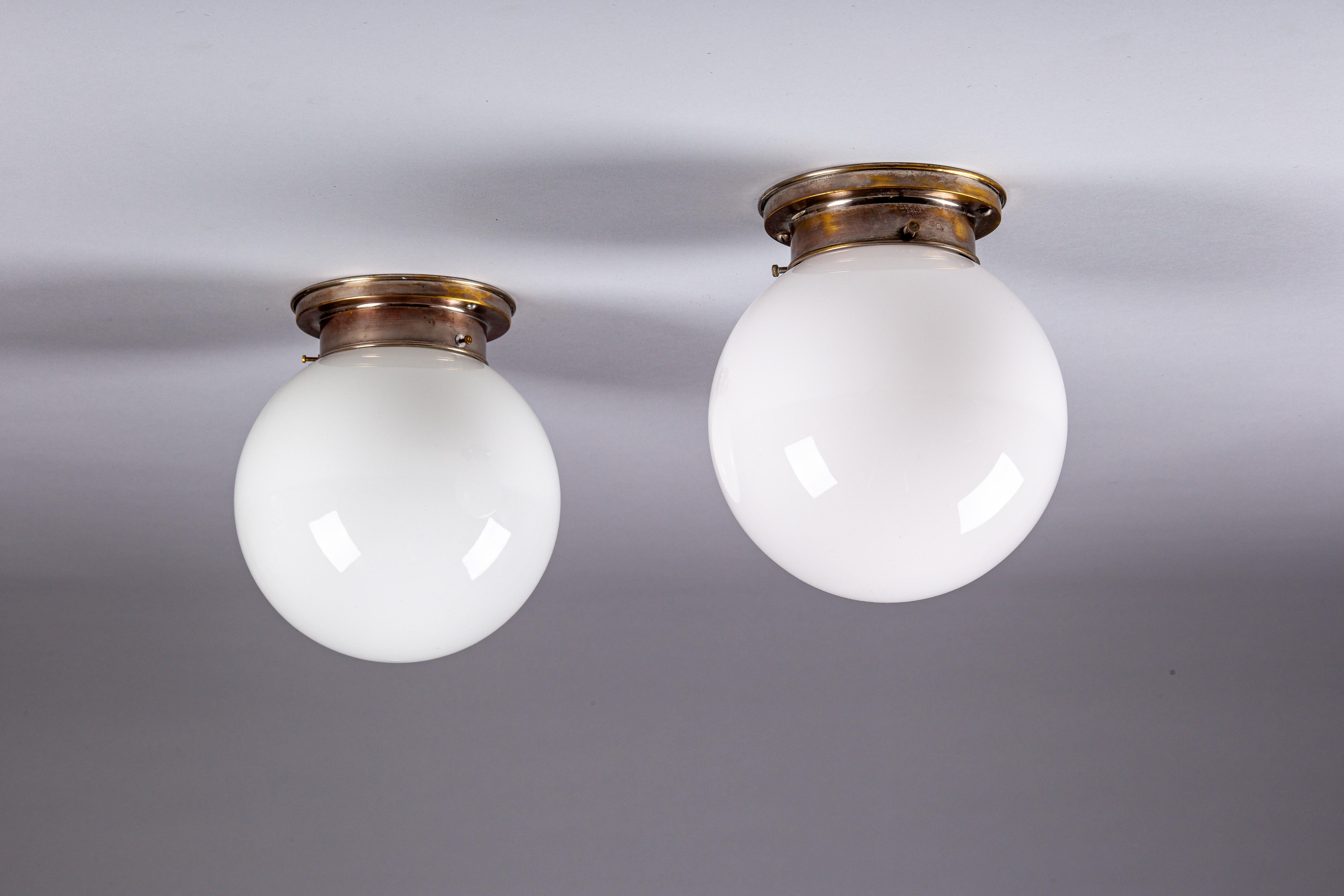 Art Deco Paavo Tynell, pair of 1930's opaline glass flush mount lamps for Idman Oy
