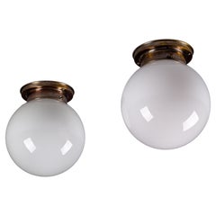 Antique Paavo Tynell, pair of 1930's opaline glass flush mount lamps for Idman Oy