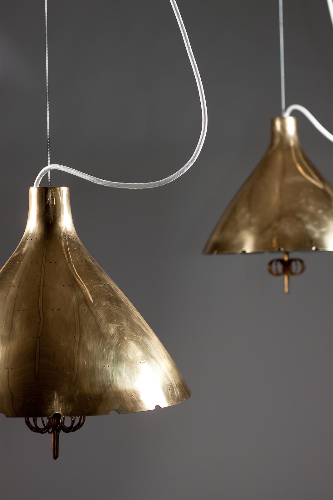 Paavo Tynell, pair of 1940's brass counterweight pendant lamps, Taito Oy 6
