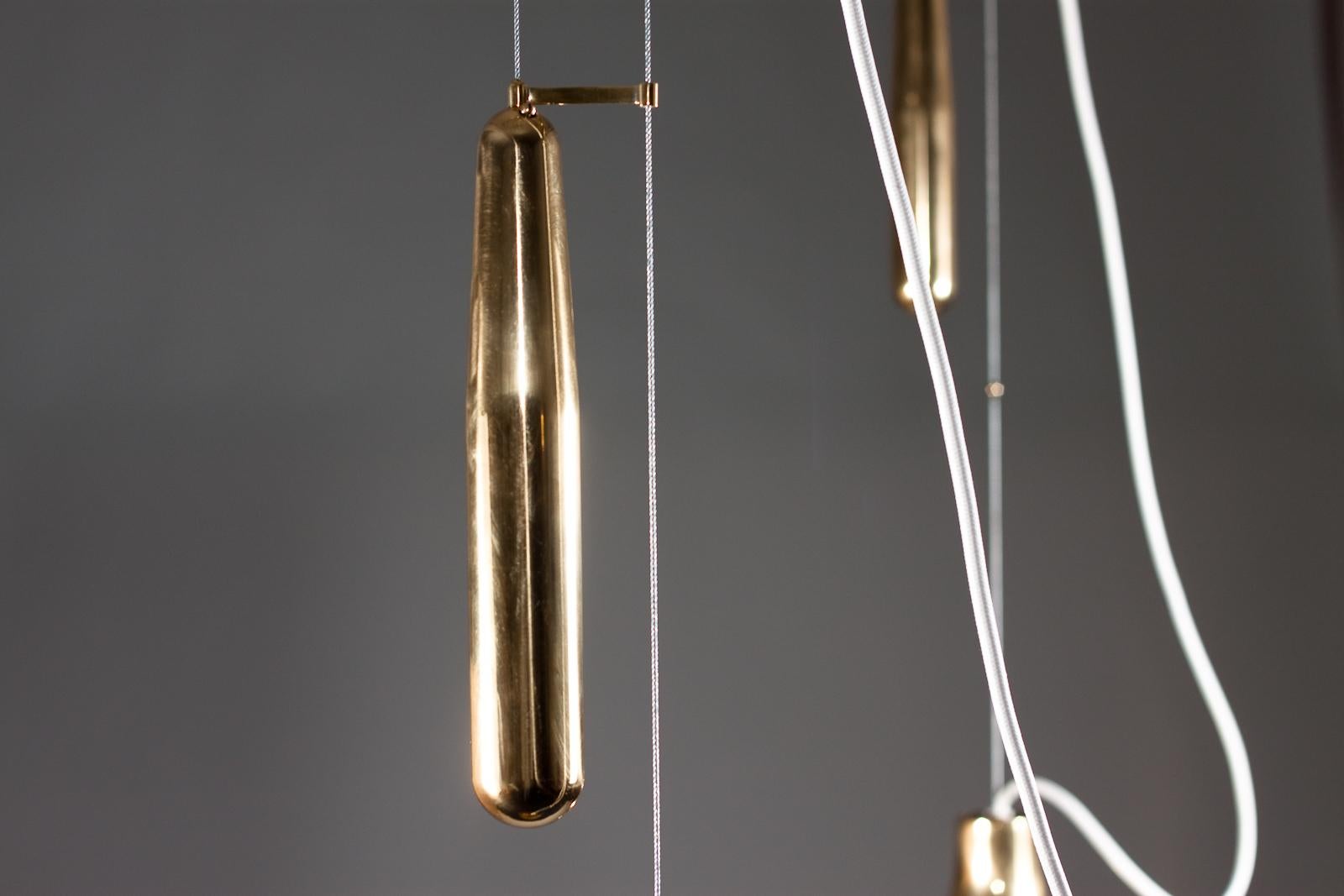 Paavo Tynell, pair of 1940's brass counterweight pendant lamps, Taito Oy 7