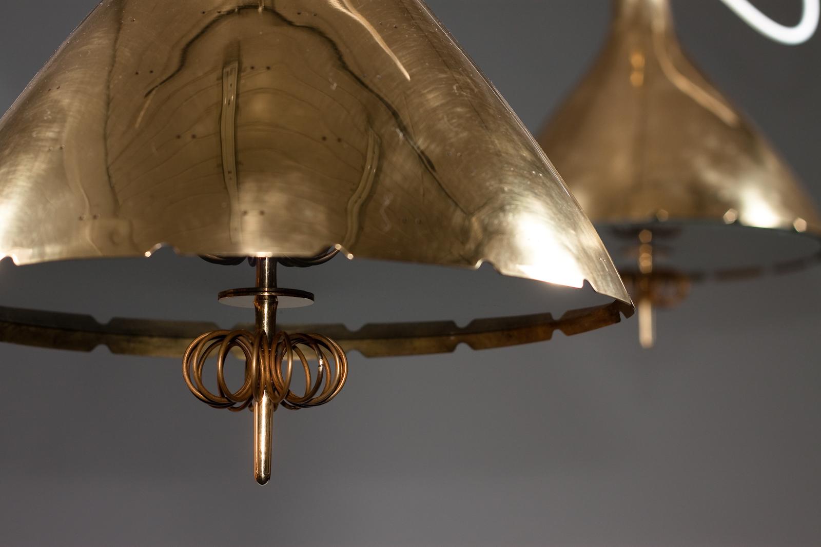 Paavo Tynell, pair of 1940's brass counterweight pendant lamps, Taito Oy 8