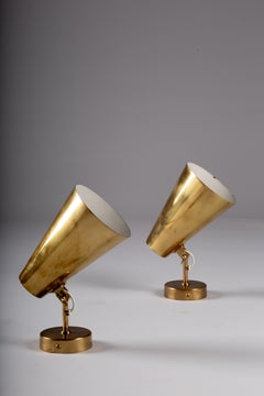 Paavo Tynell, pair of c.1950's brass wall sconces for Idman Oy