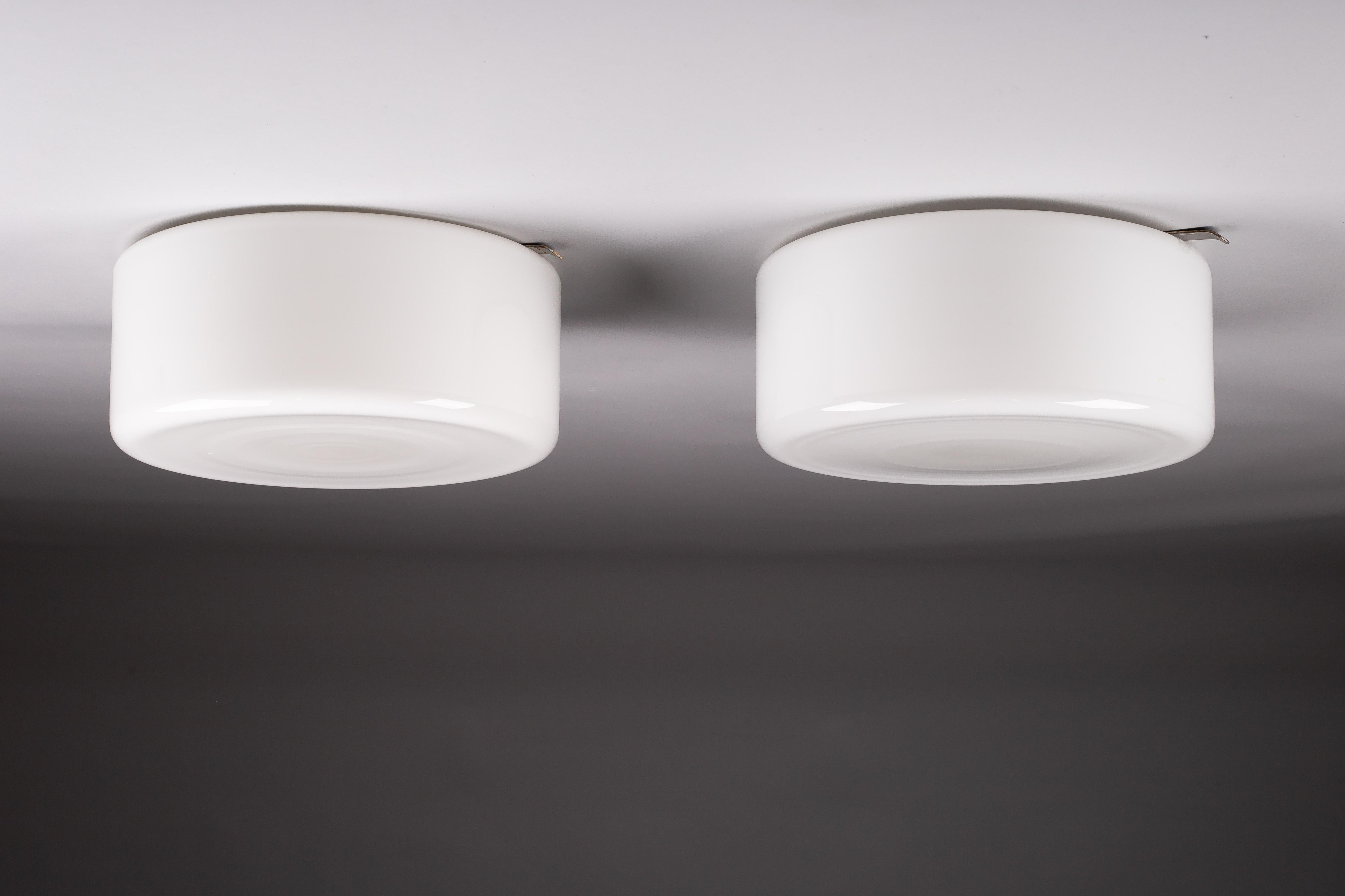 Mid-Century Modern Paavo Tynell, pair of flush mounts (∅30 cm), Idman Oy For Sale