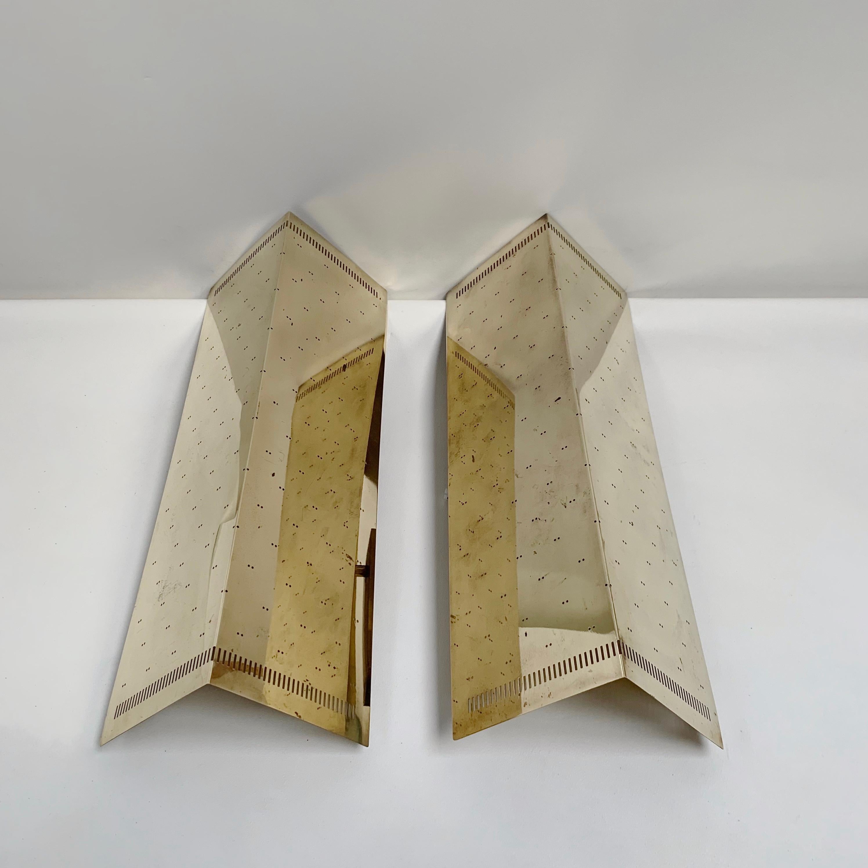 Mid-20th Century  Paavo Tynell Rare Pair Of Large Perforated Brass Sconces, circa 1960, Finland.