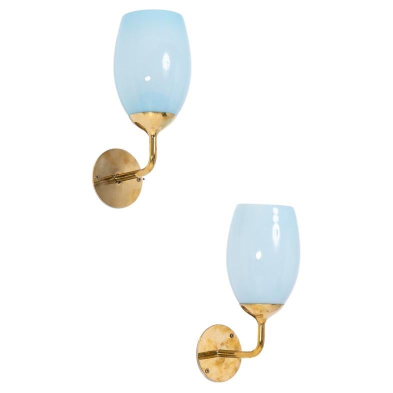 Paavo Tynell Pair of Wall Lights in brass and blue glass, 1940s For Sale