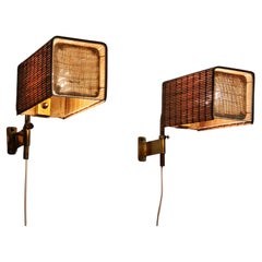 Paavo Tynell Coppia di luci da parete modello 9436 con paralumi in rattan, Taito 1940s