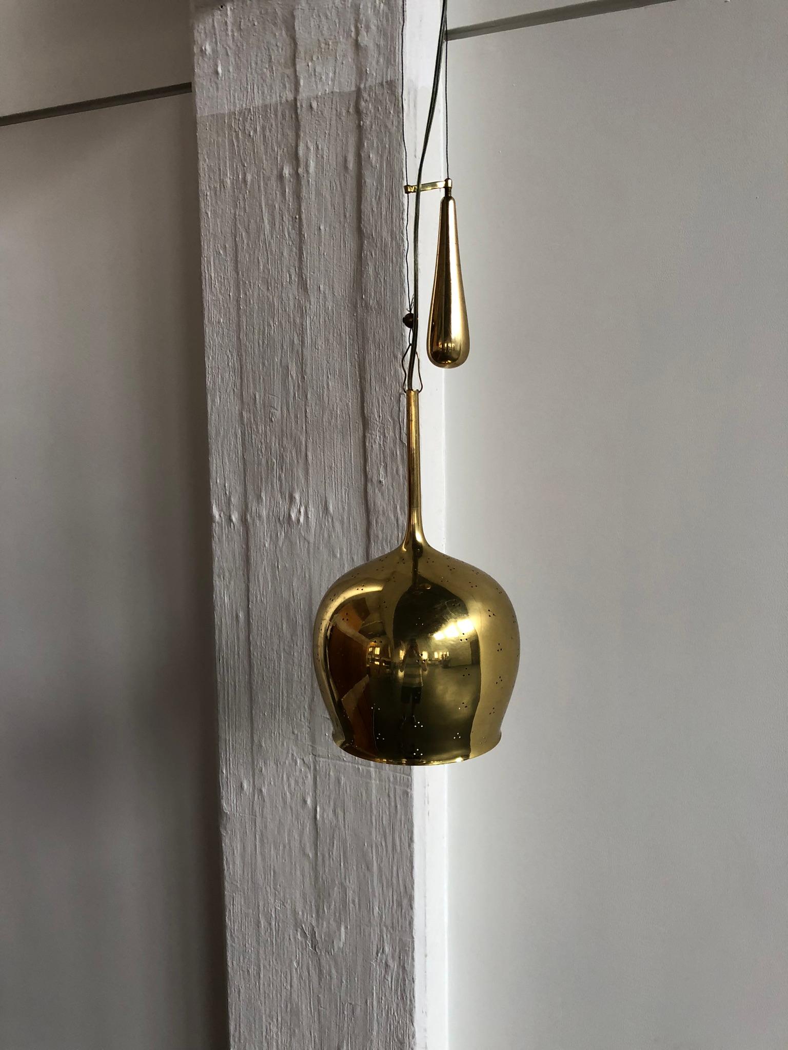Finnish Paavo Tynell Pendant in Perforated Brass with Counter Weight for Taito Oy For Sale