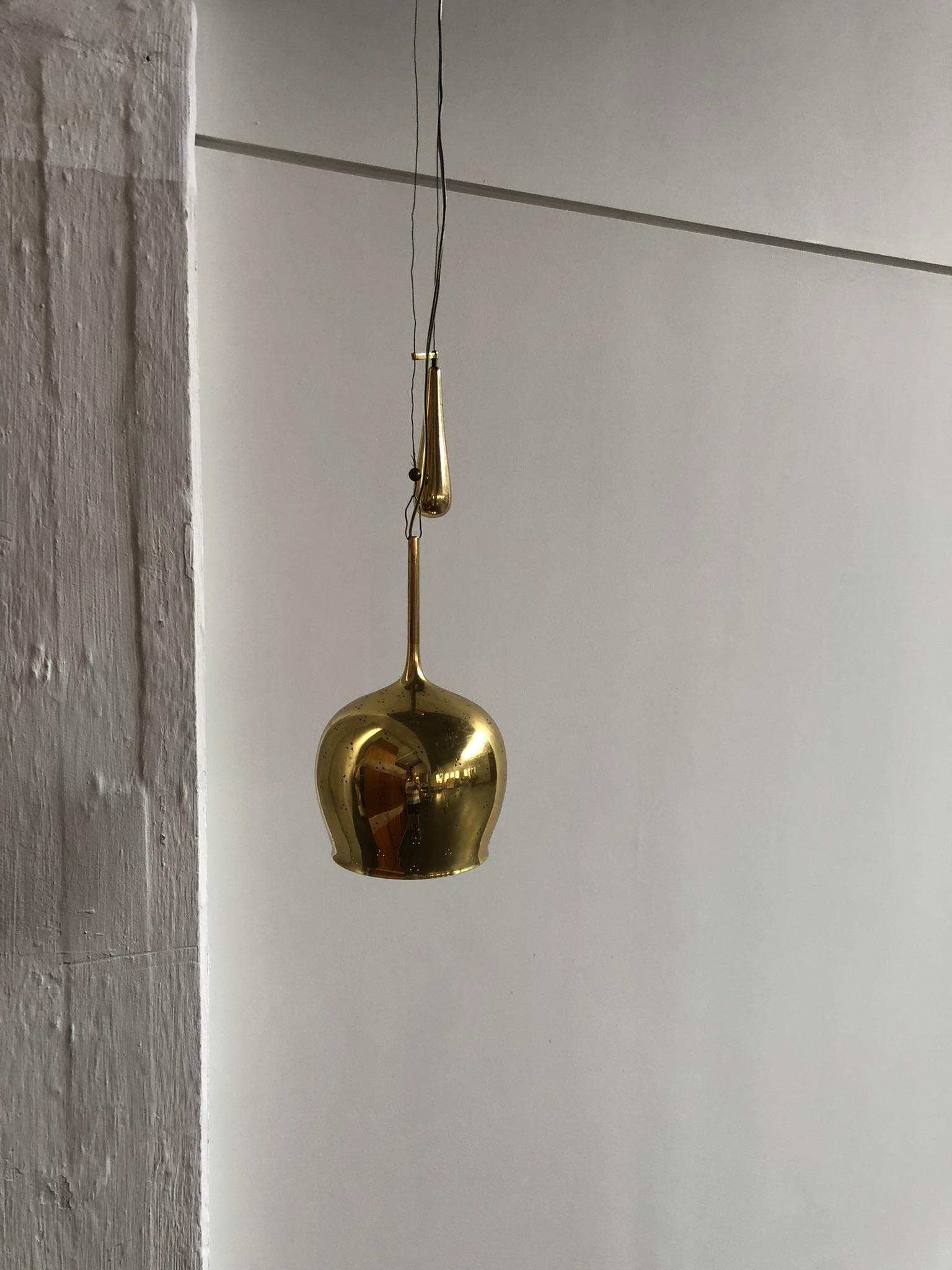 Paavo Tynell Pendant in Perforated Brass with Counter Weight for Taito Oy For Sale 1