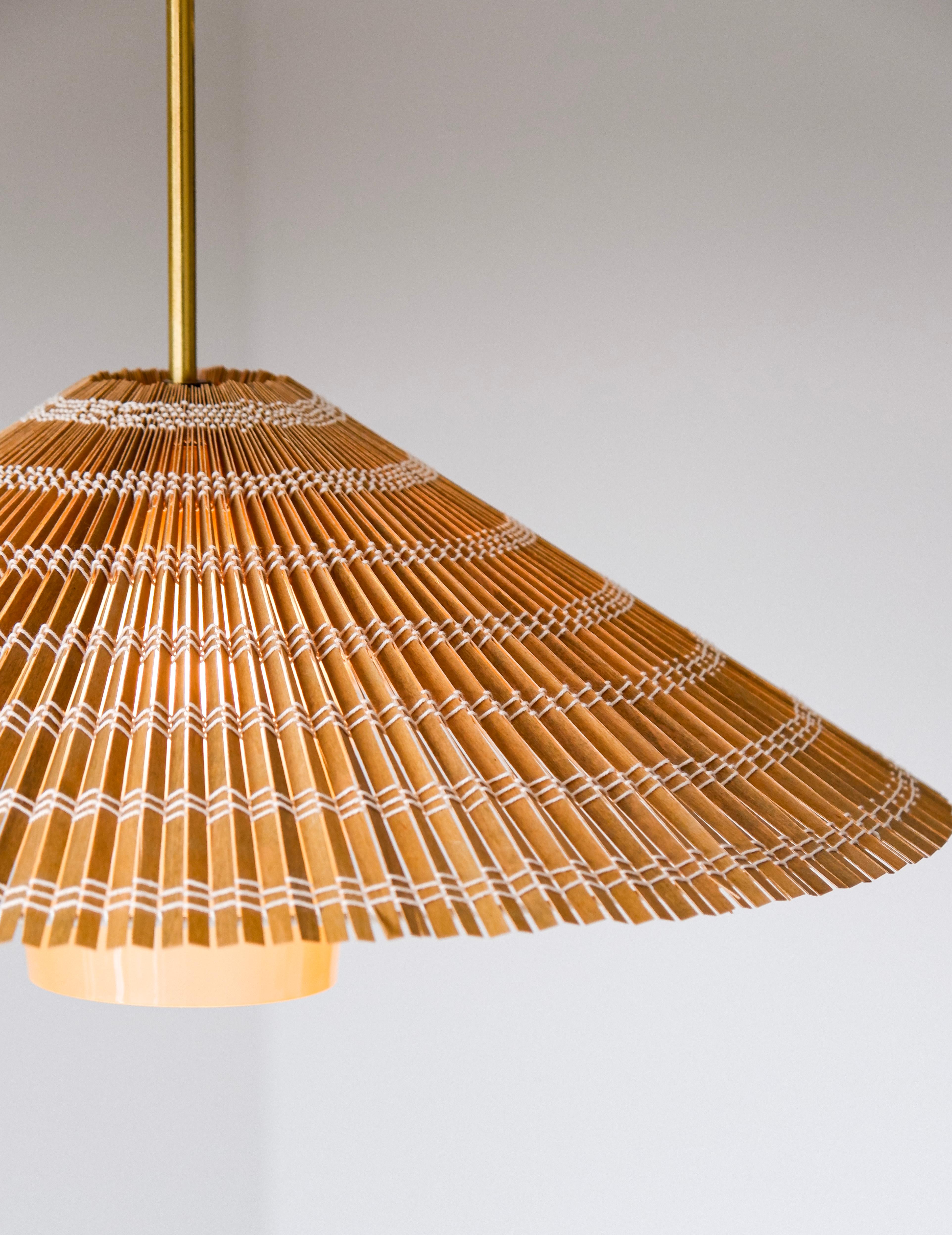 Scandinavian Modern Paavo Tynell pendant model 1083 for Taito, brass, Opal & rattan For Sale