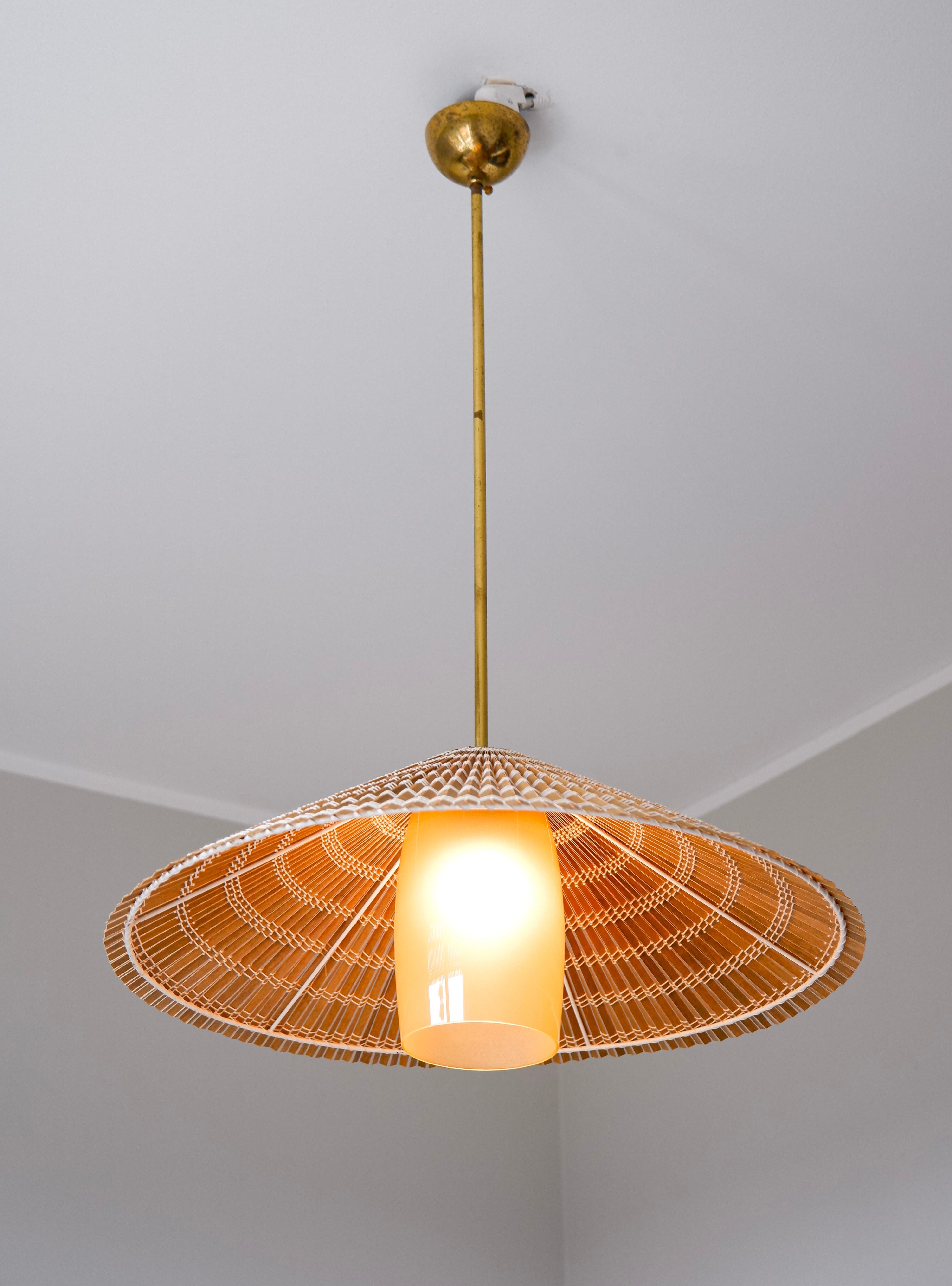 Mid-20th Century Paavo Tynell pendant model 1083 for Taito, brass, Opal & rattan For Sale