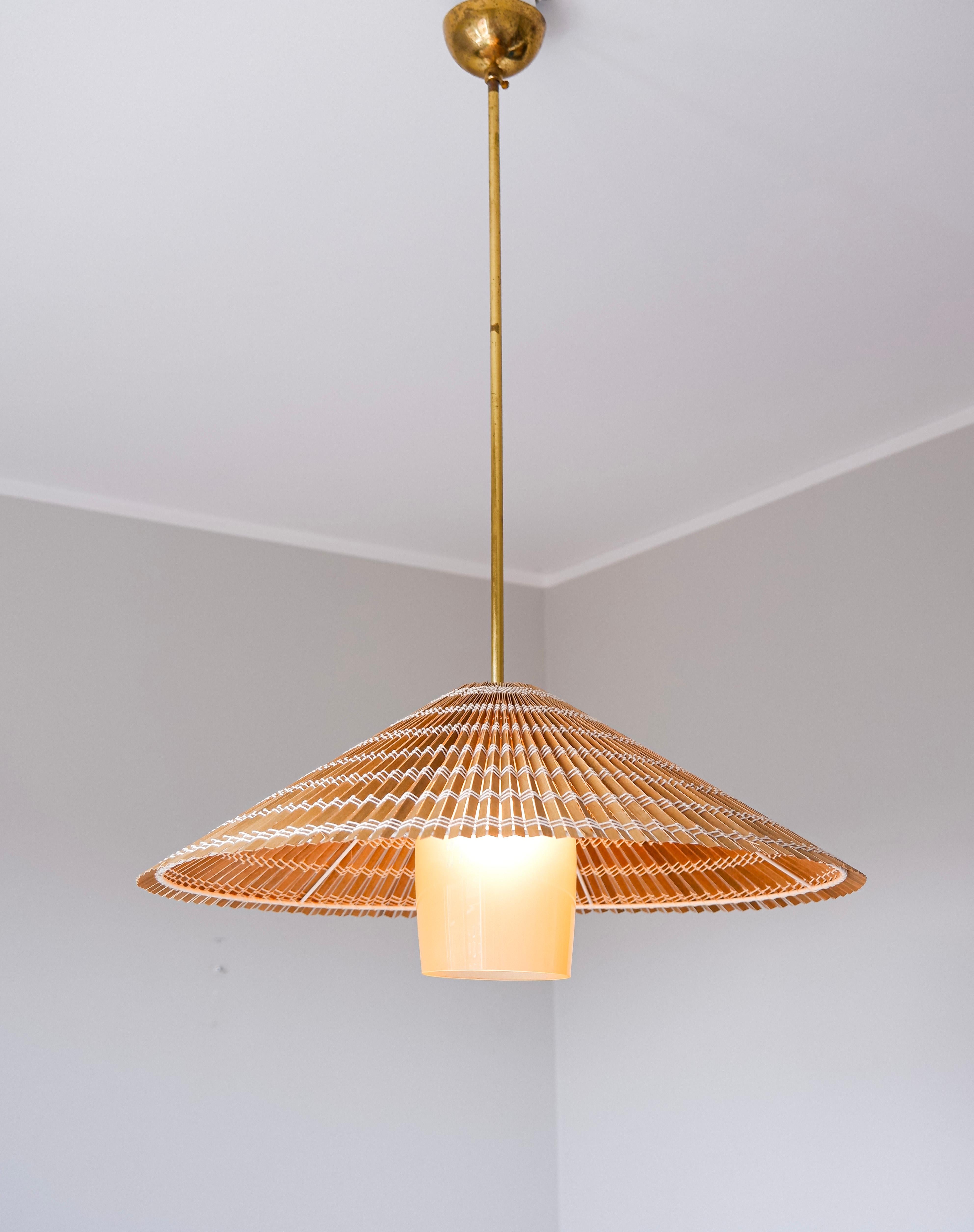 Brass Paavo Tynell pendant model 1083 for Taito, brass, Opal & rattan For Sale