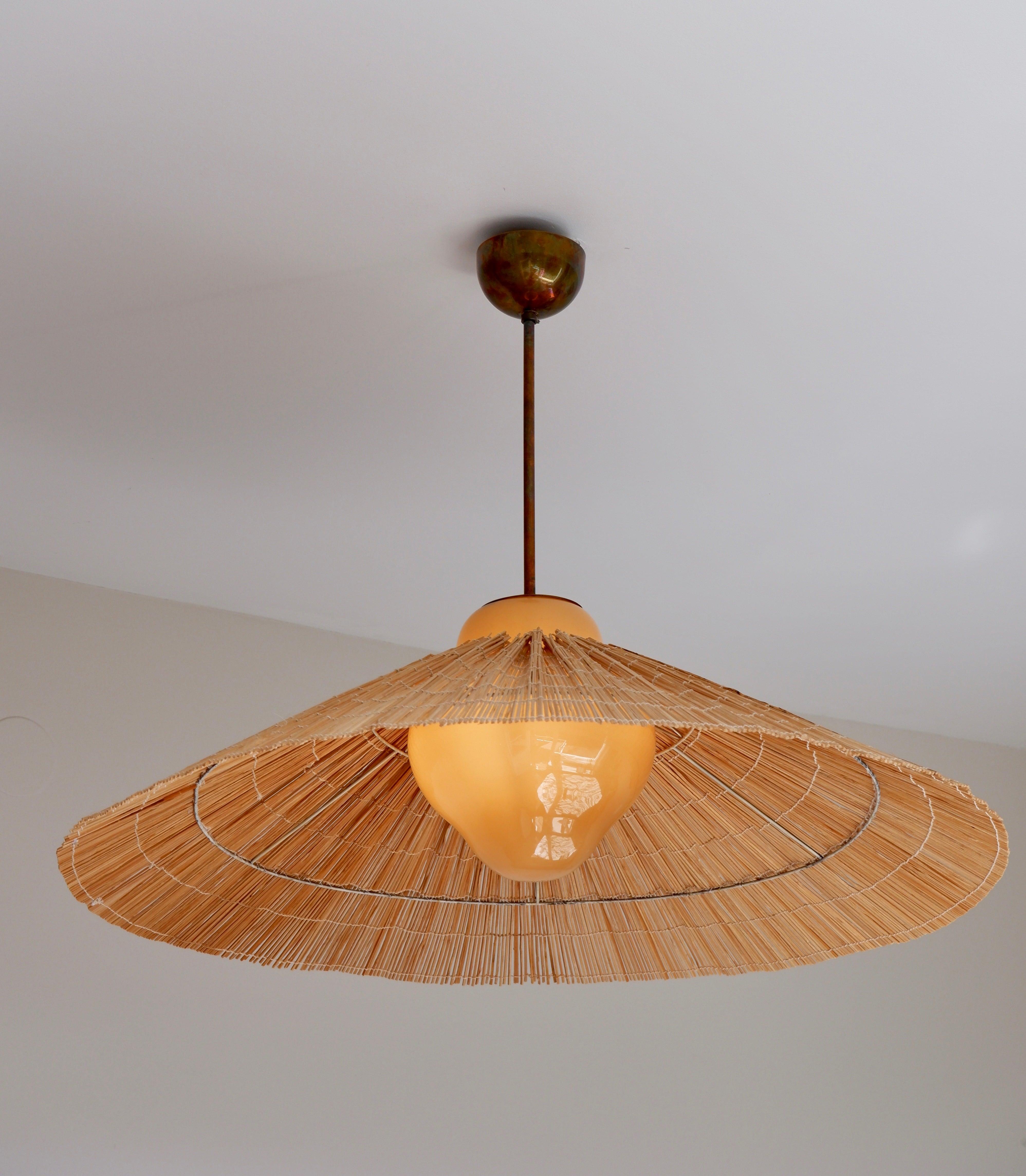 Scandinavian Modern Paavo Tynell Pendant Model 1092 for Taito Opal Glass, Brass and Rattan