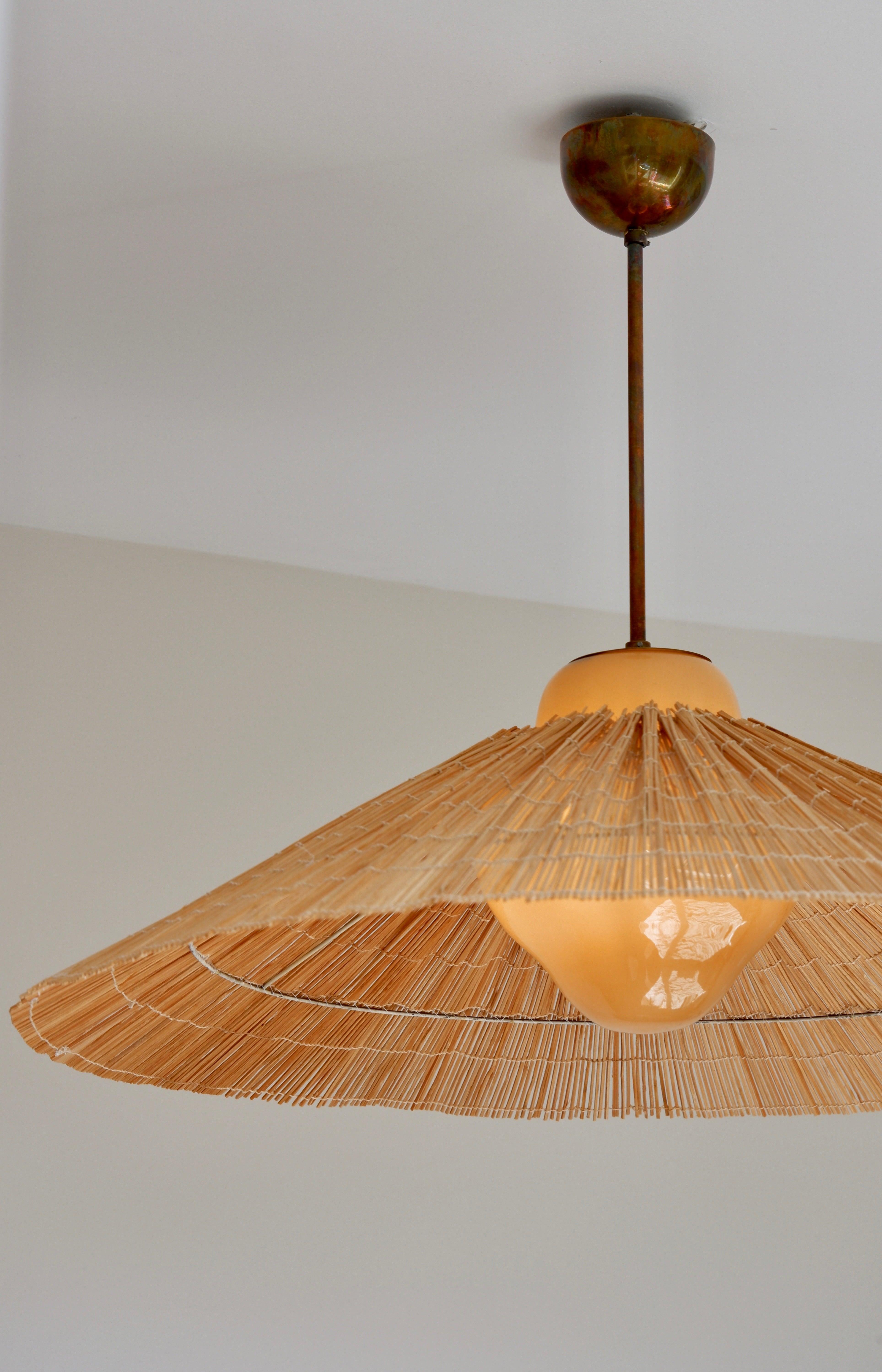 Paavo Tynell Pendant Model 1092 for Taito Opal Glass, Brass and Rattan In Fair Condition In Hägersten-Liljeholmen, Stockholms län