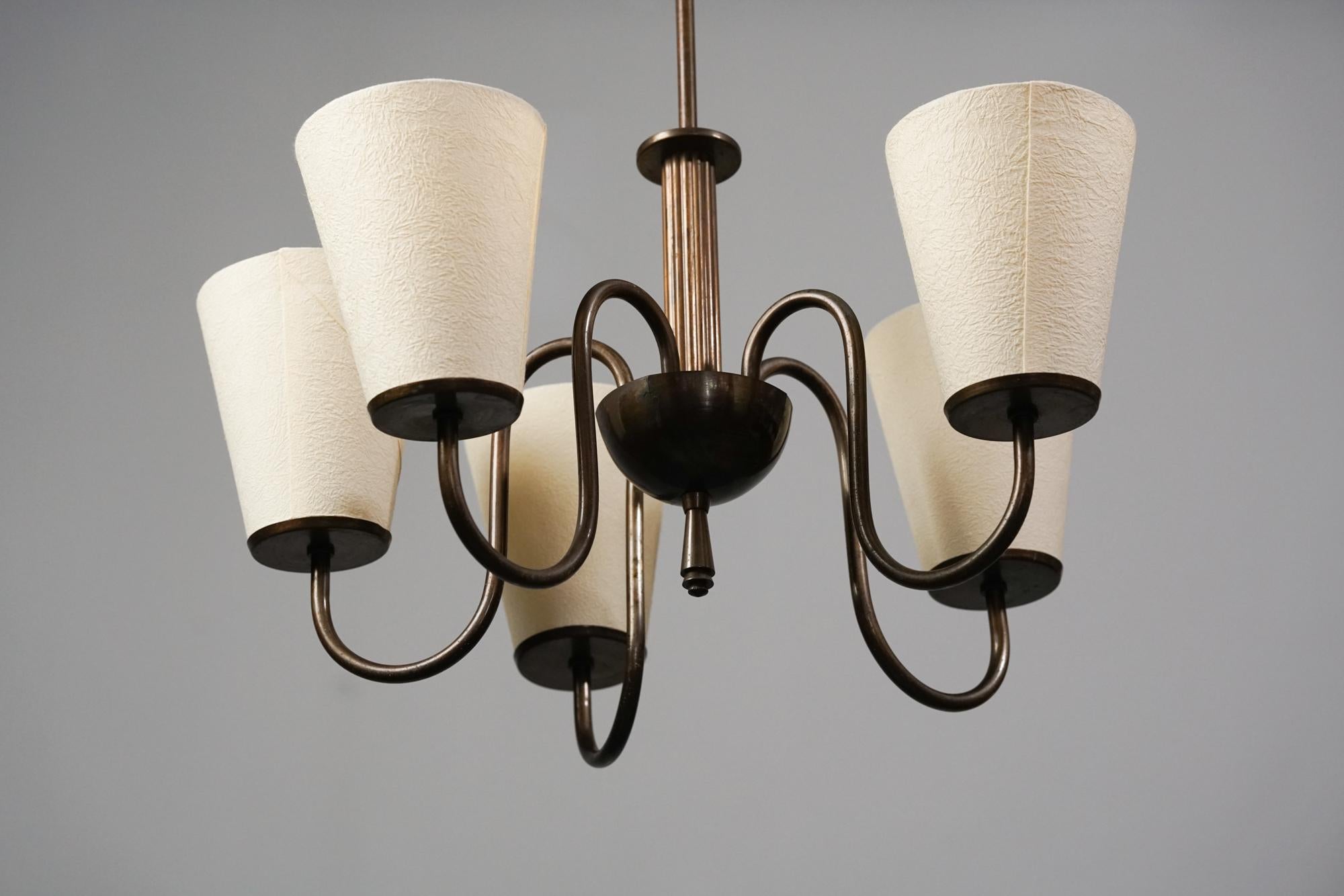 Paavo Tynell pendant model 1419 for Taito Oy from the 1930s. Bronze frame with fabric shades. The lampshades are not original. Good vintage condition, minor patina consistent with age and use. Classic Paavo Tynell pendant with a  Scandinavian Modern
