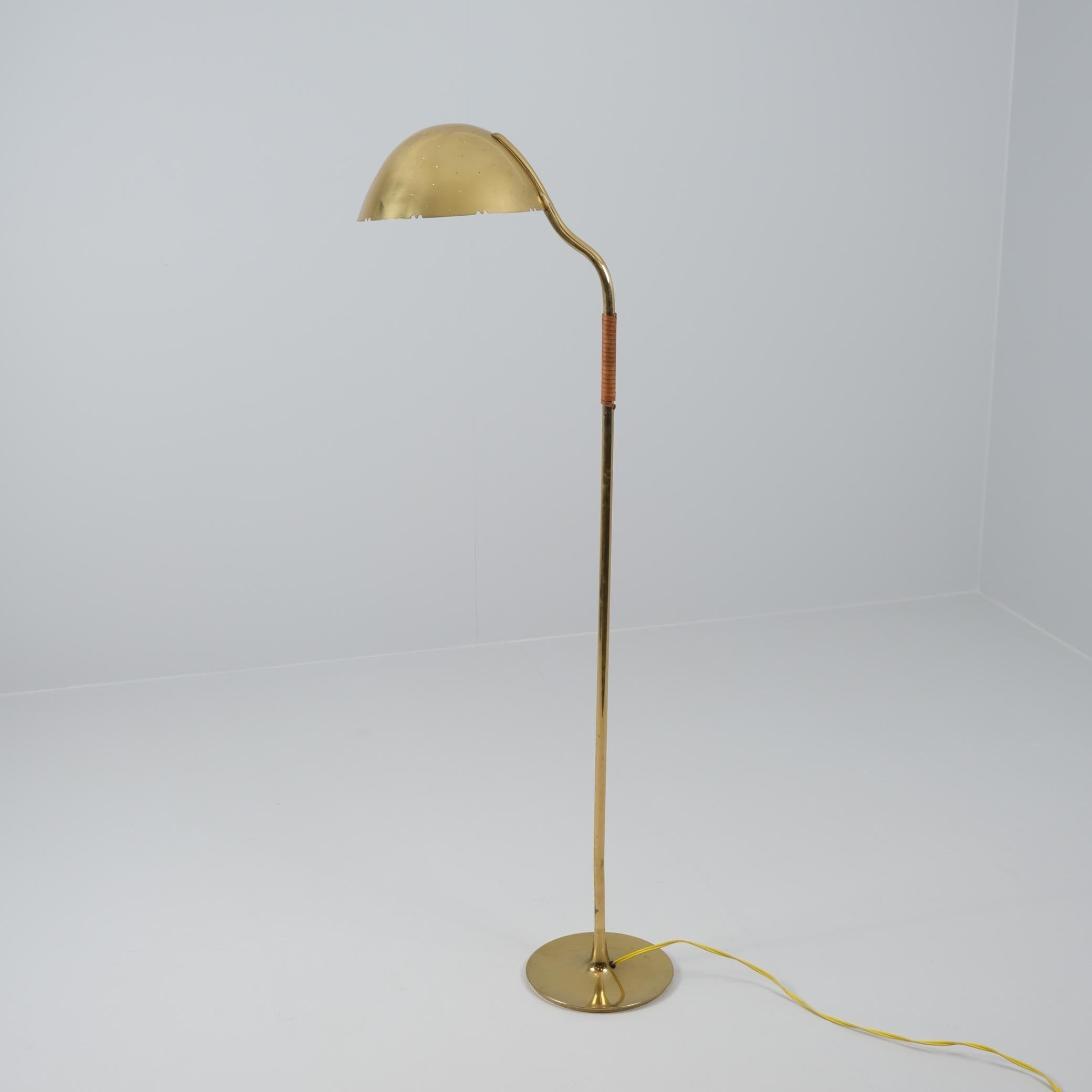 A beautiful bijou floor lamp, Model 9608 by Paavo Tynell. This rare and iconic lamp is nicknamed the 