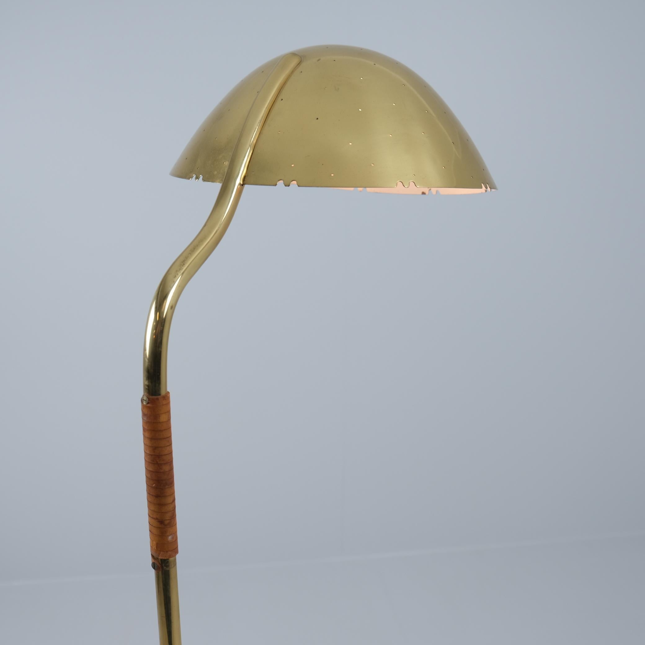 Scandinavian Modern Paavo Tynell Perforated Brass and Leather Floor Lamp Model 9608, Taito 1950s For Sale