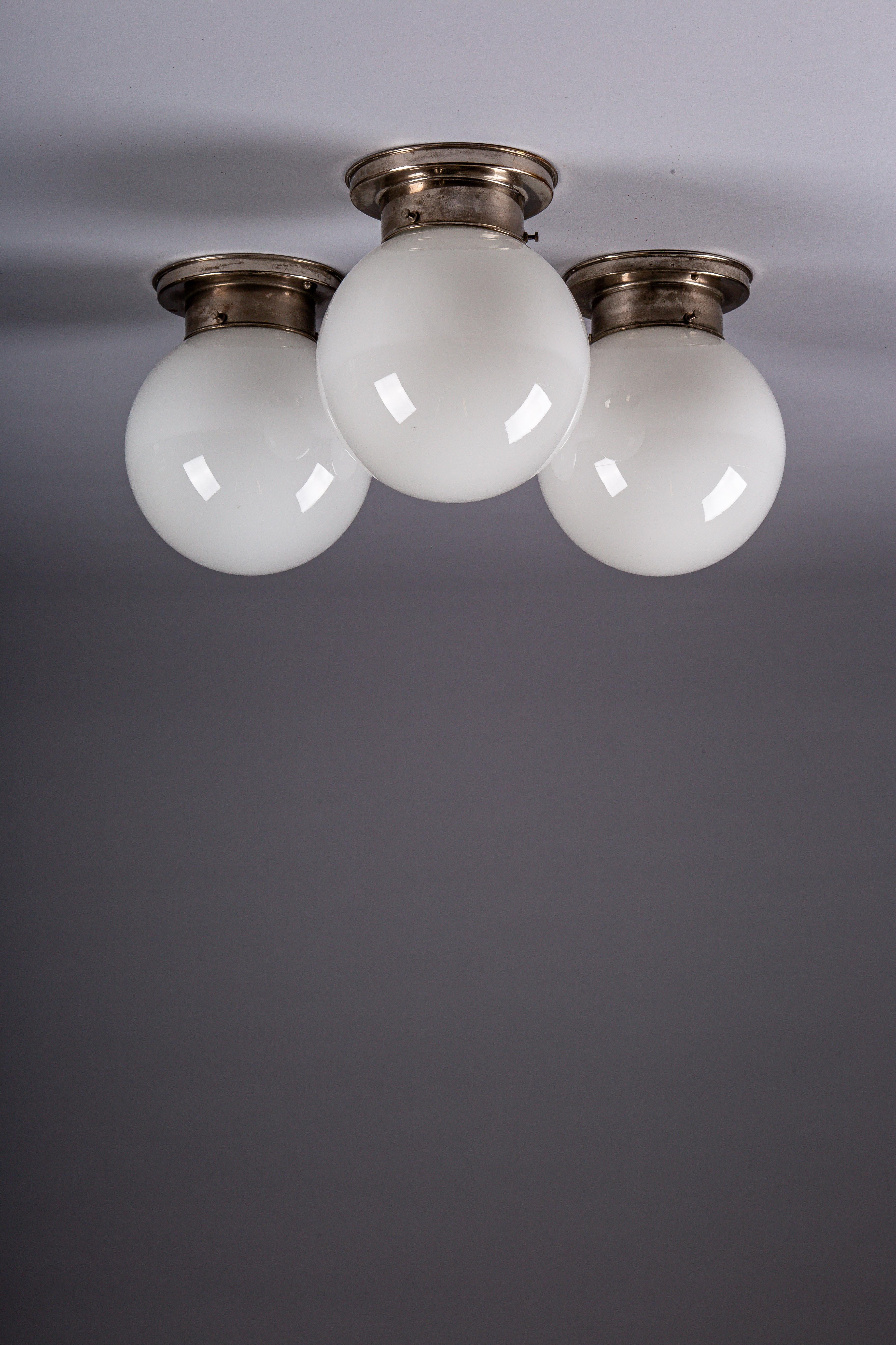Finnish Paavo Tynell, set of 1930's opaline glass flush mount lamps for Idman Oy