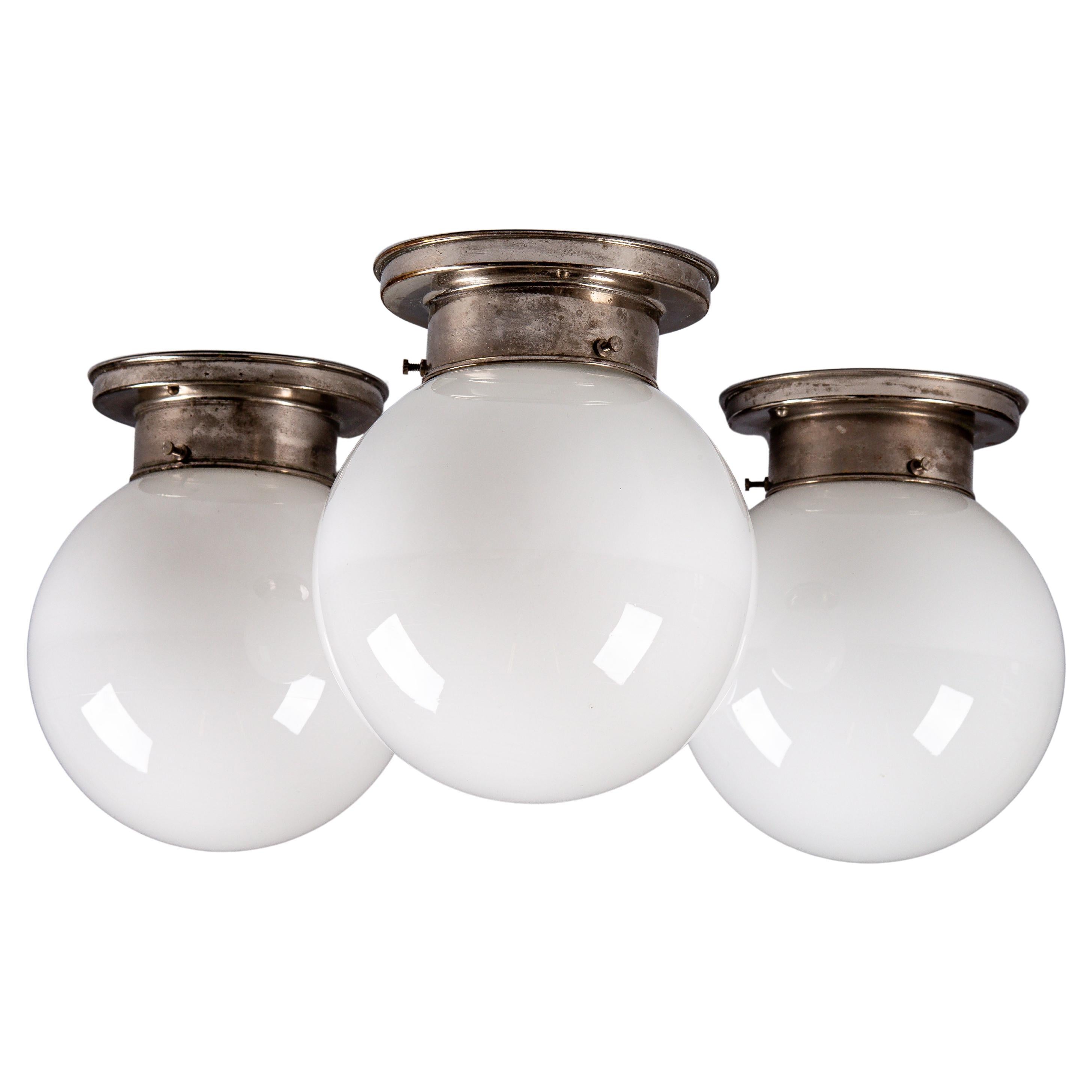 Paavo Tynell, set of 1930's opaline glass flush mount lamps for Idman Oy