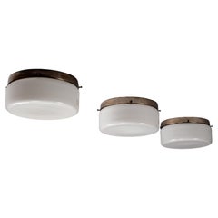Paavo Tynell, set of three 1930s opaline glass flush mounts, Taito Oy