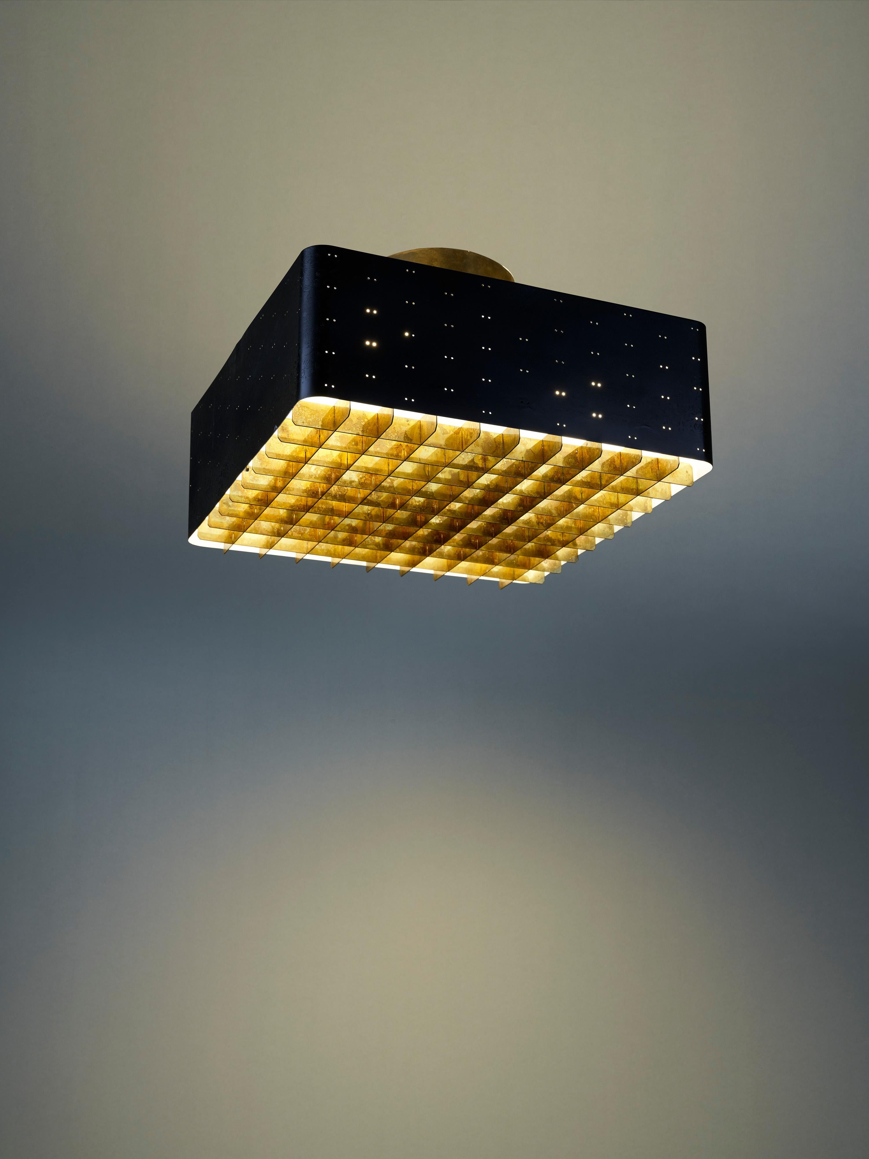 The Starry Sky stands as one of Paavo Tynell's most iconic lamp designs, produced by both Taito and Idman in various sizes. Its unique grill and side perforations create a celestial effect, resembling a starry sky when illuminated. Due to its
