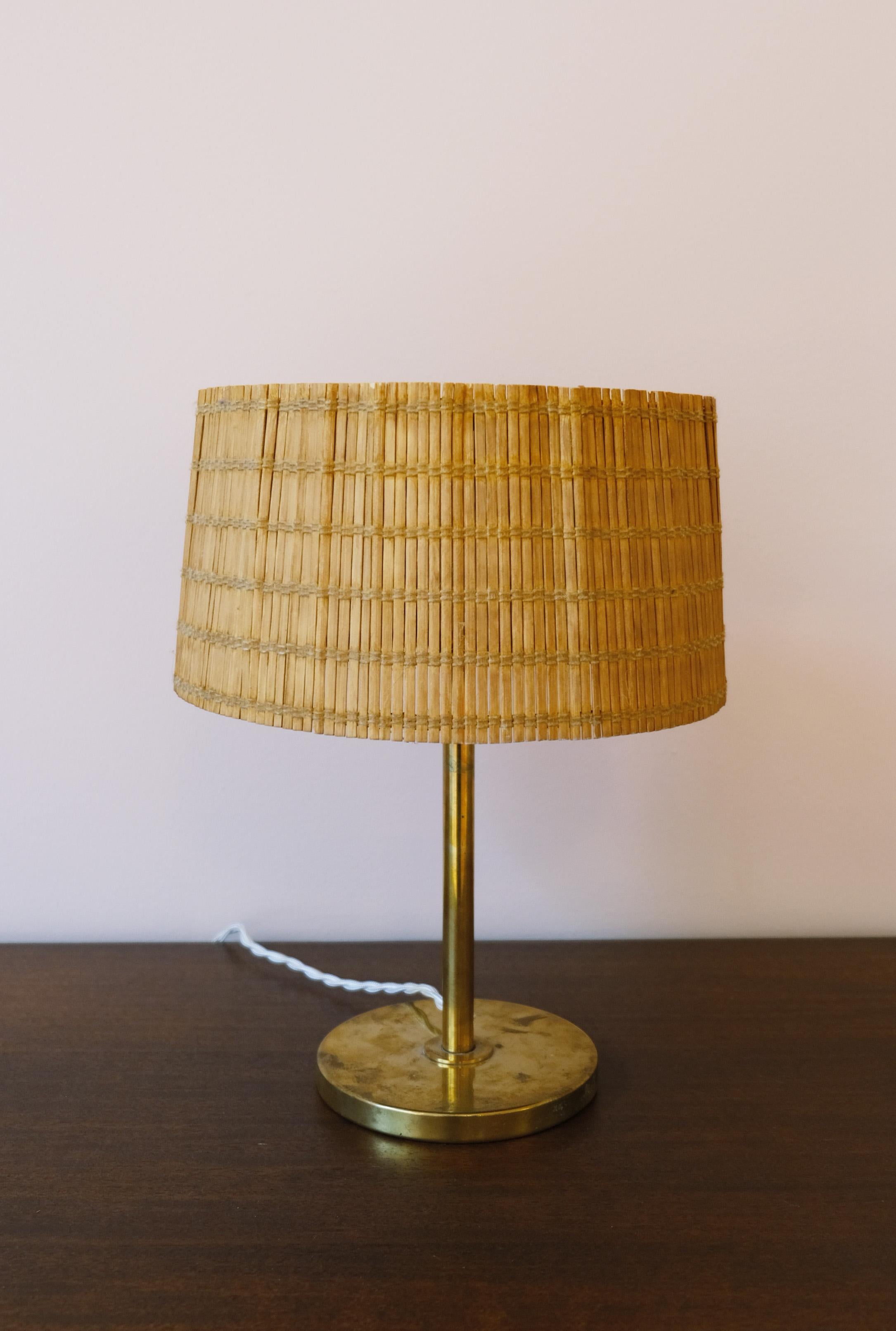 Beautiful desk lamp by Paavo Tynell, renowned Finnish designer. Fantastic condition, stamped on the underside 'Taito'.