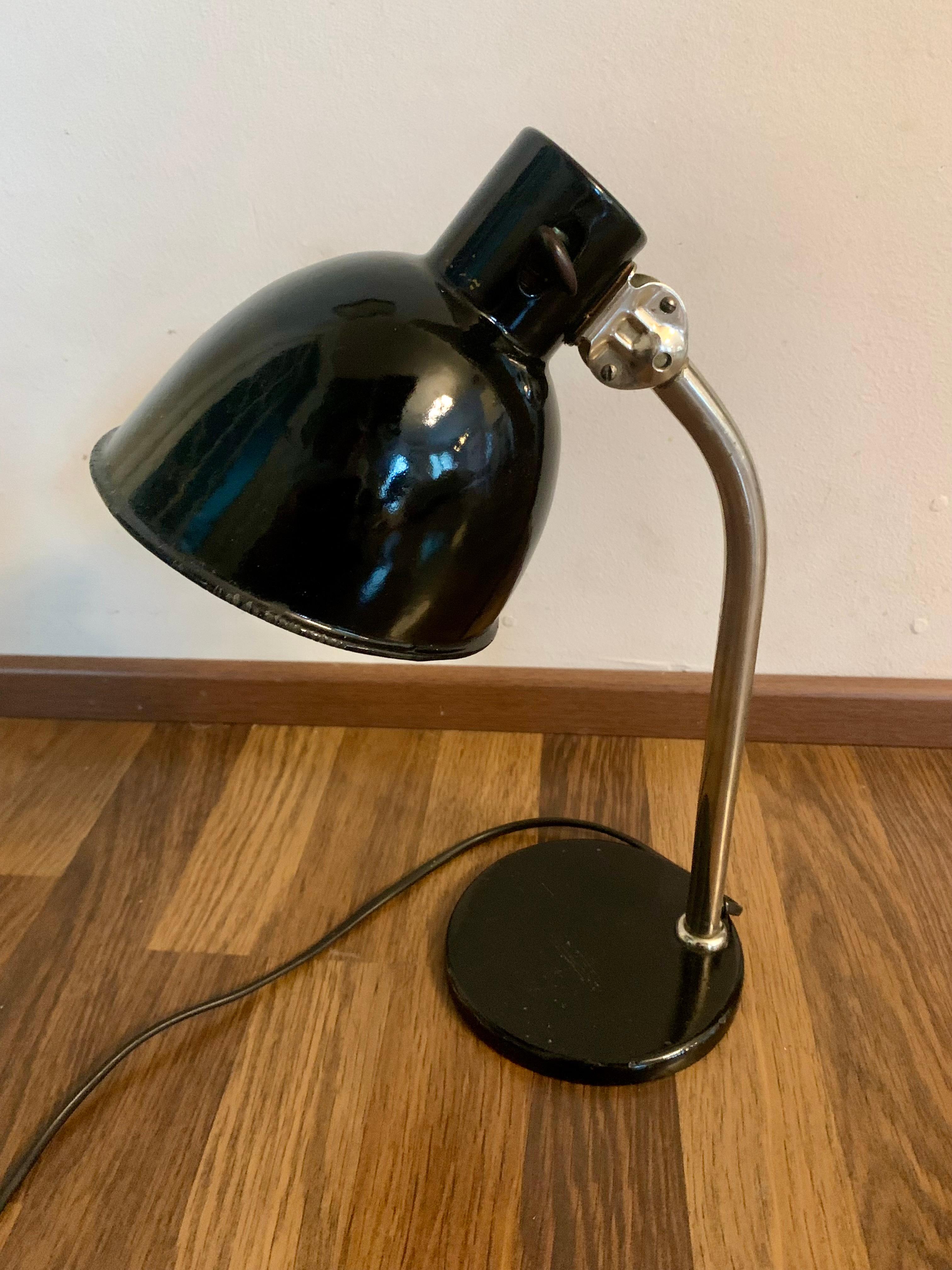 
**Paavo Tynell's Table Lamp, Model 5307**

Paavo Tynell (1890-1973) was a renowned Finnish metal artist and lighting designer, who began his career as a tinsmith apprentice and studied at the Central School of Art and Design to become a