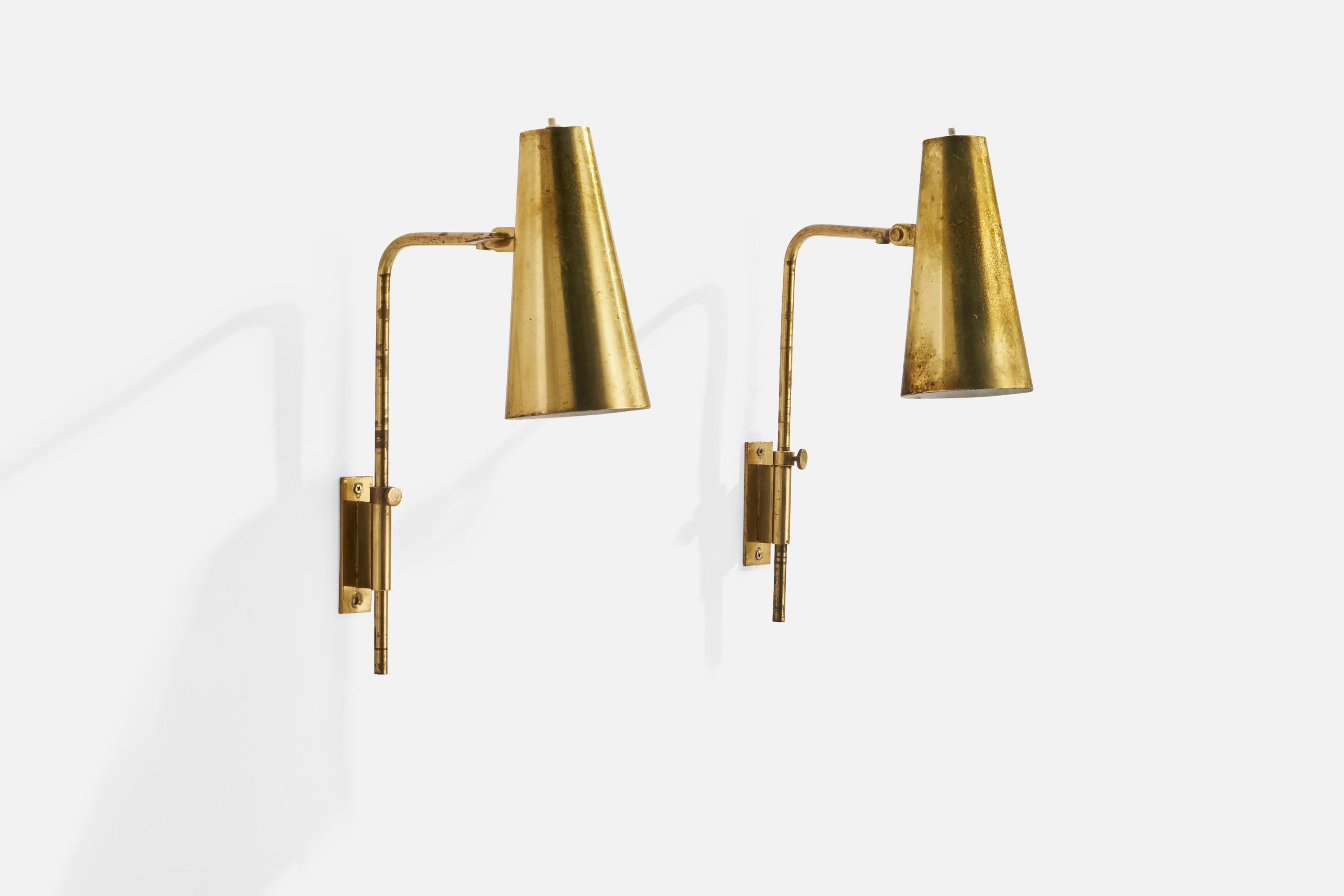 A pair of adjustable brass wall lights designed by Paavo Tynell and produced by Taito OY, Finland, 1950s.

Overall Dimensions (inches): 15.75”  H x 3.78” W x 12.21” D
Back Plate Dimensions (inches): 3.75” H x 1.25” W x .25” D
Bulb Specifications: