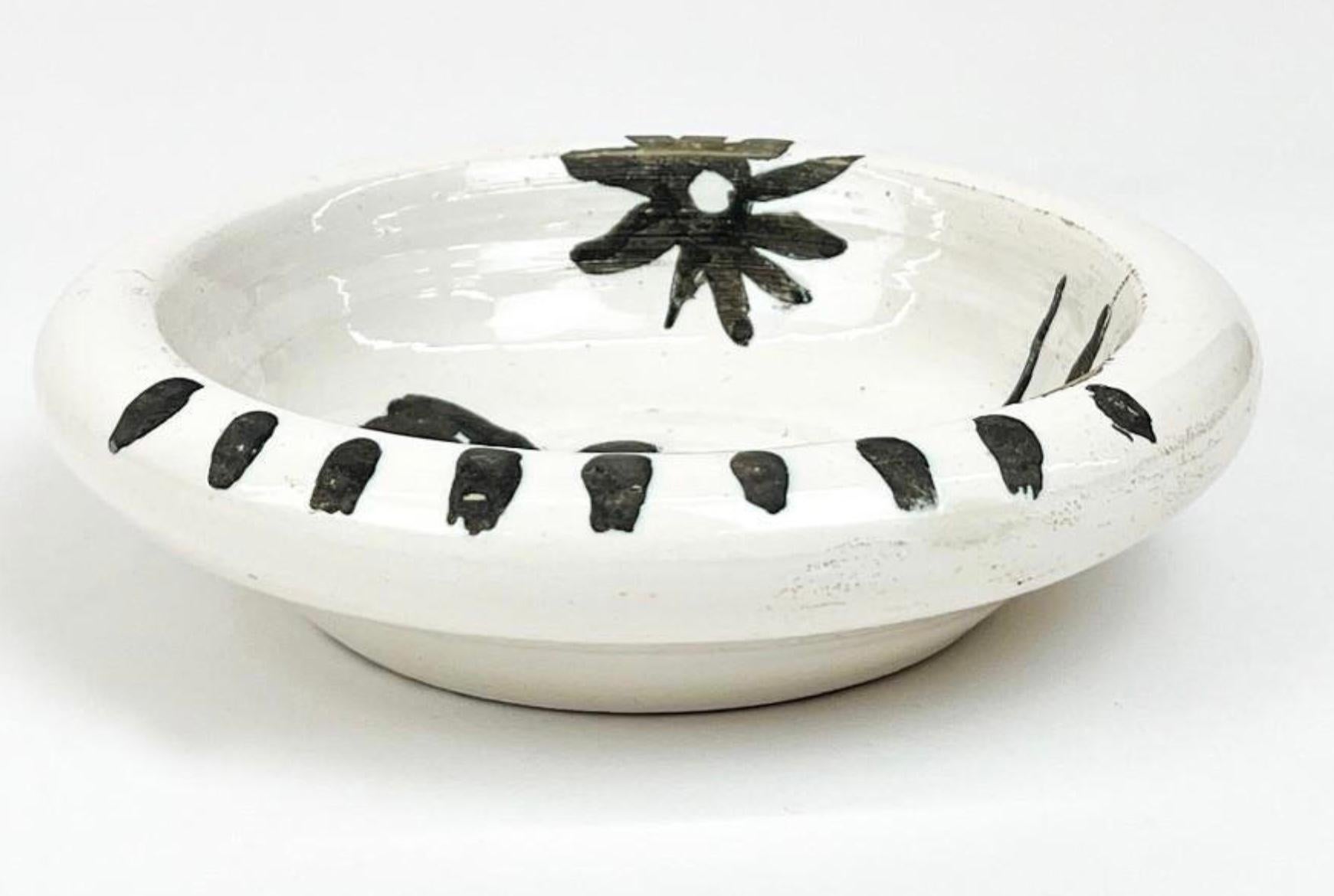 Pablo Picasso
1881 - 1973
Oiseau au Soleil
Terre de faïence Dish, 1952, from the edition of 500, incised 'Edition Picasso', partially glazed and painted, with the Edition Picasso and Madoura stamps
Measure: Diameter: 150mm 6in.